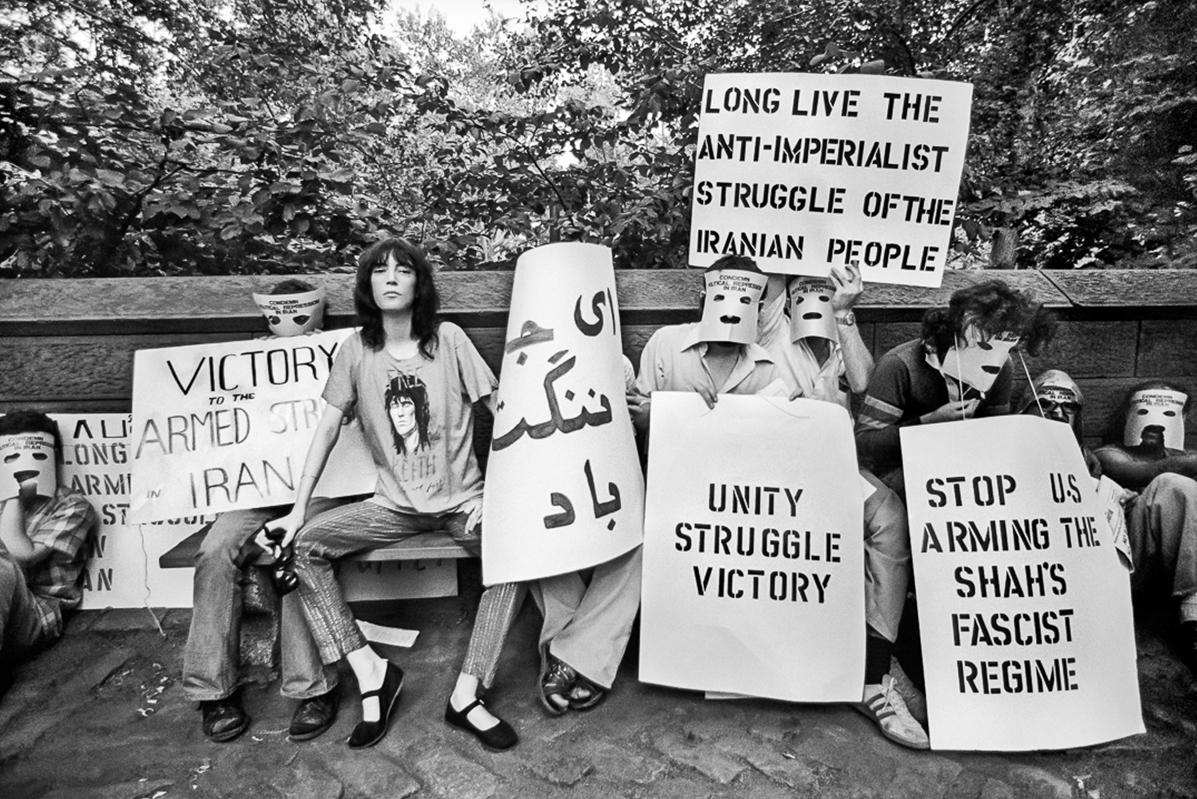 Lynn Goldsmith Black and White Photograph - Patti Smith 1975 Iran War Protest, framed first print of the edition #1/20