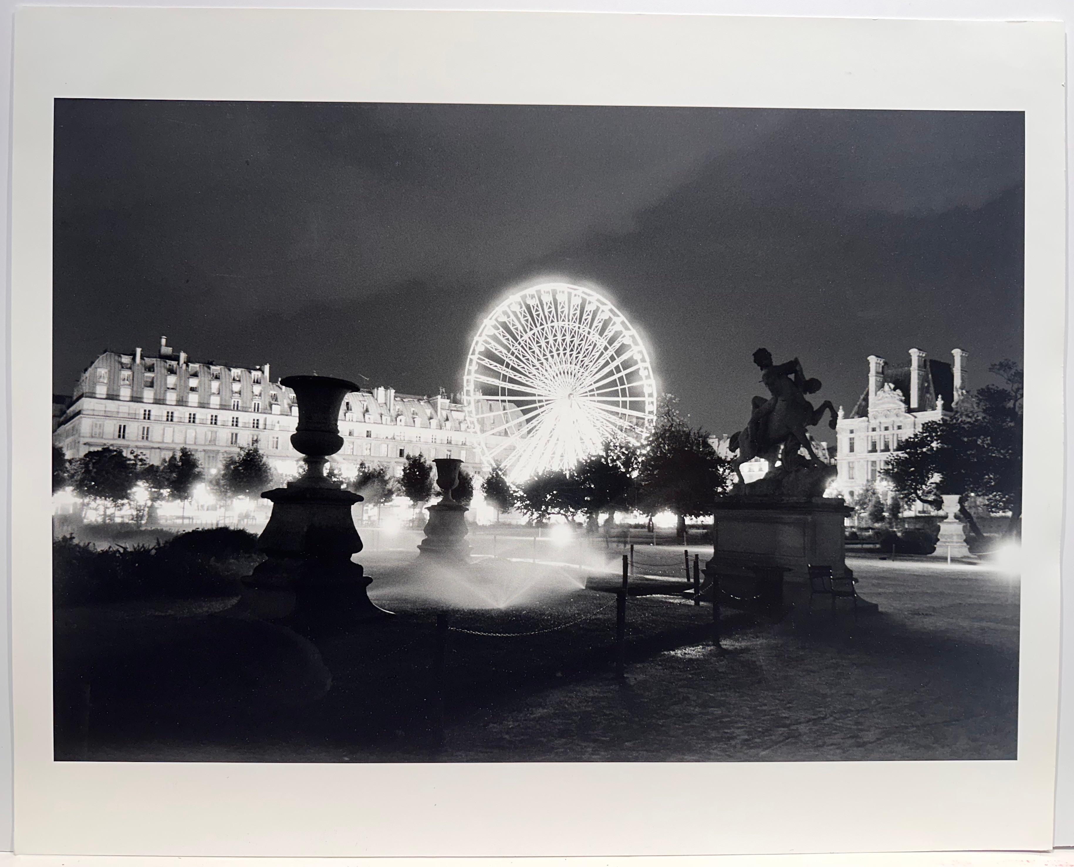 Lynn Saville. Ferris Wheel from the Tuileries, 1999. Photographic print. Edition 5/25. Image measures 12.5 x 18 inches. Sheet is larger. Measures 21.5 x 27 framed. Signed, titled and dated on reverse. 