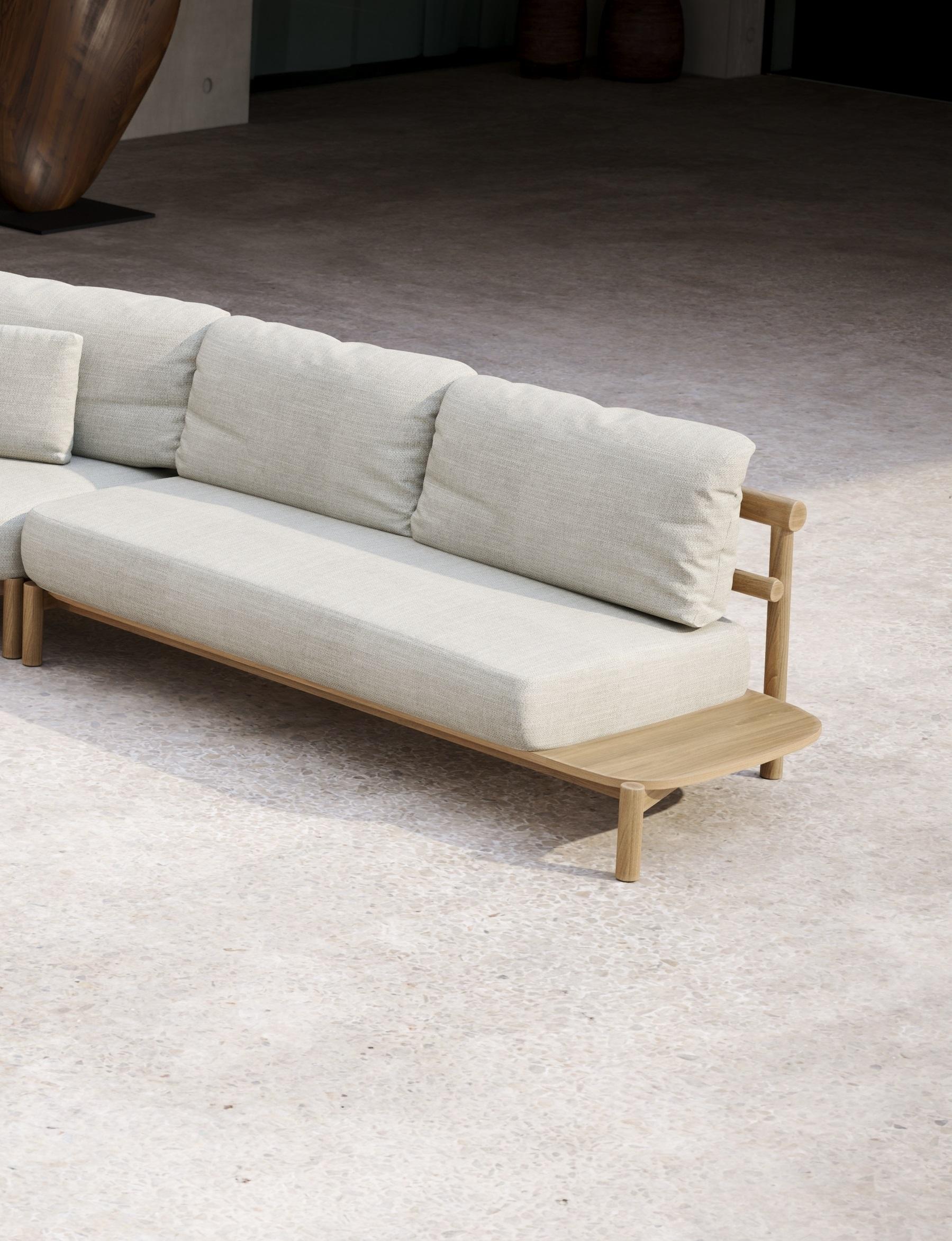 Lyora Teak Wood And Ethereal Fabric Two-Seater Modular Sofa With Table by SNOC
Dimensions: D 88 x W 195 x H 66 cm. SH: 42 cm.
Materials: Teak wood and Ethereal fabric. 

A delicate mid-century style, tempered by contemporary and eclectic incursions