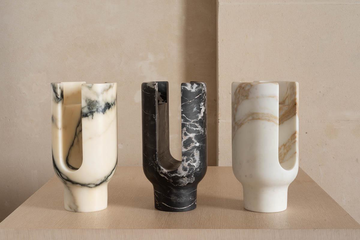 Lyra 
Candleholder
Design Dan Yeffet

Lyra is a torchbearer, a flaming metaphor, an anthem to the material. A marble piece cut in the mass which reveals a varying figure, sometimes oblong, massive, rounded, full or hollowed. The scented capsule