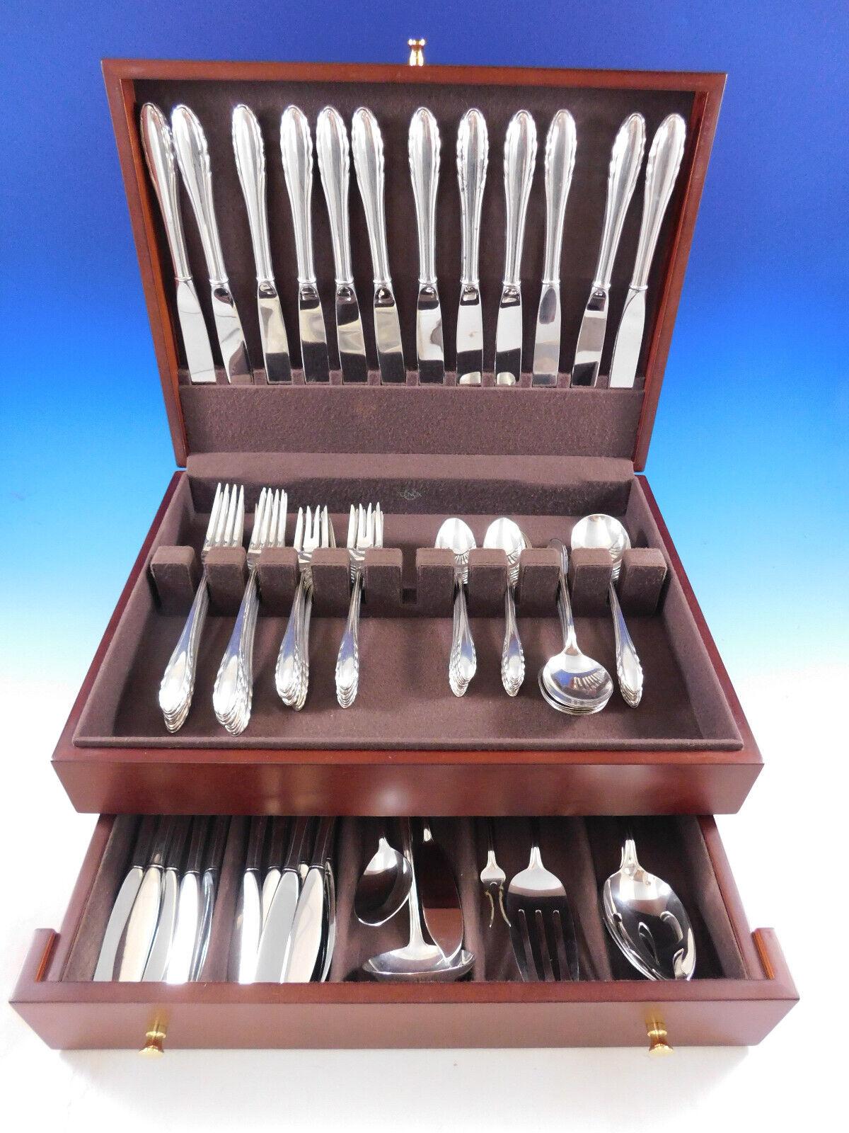 Dinner size Lyric by Gorham sterling silver flatware set, 79 pieces. This set includes:

12 dinner size knives, 9 5/8
