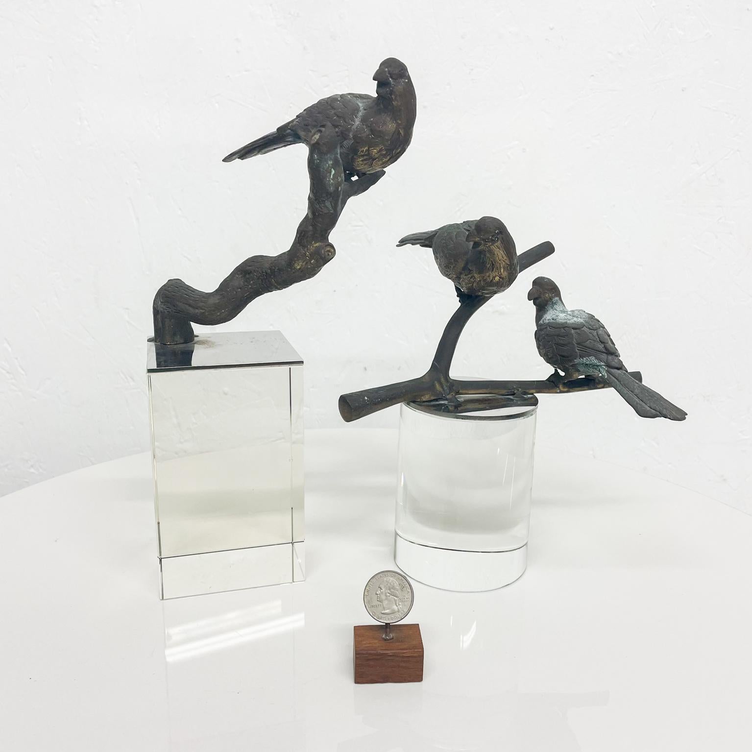 Sculpture
Bronze modern sculpture birds on a branch atop crystal block pedestal 1960s
a. 11 H x 4.75 x 5.75 b 8.25 H x 7.5 W x 8.5 D inches
Unsigned. Two-piece sculpture.
Original preowned unrestored vintage condition.
Please see images.