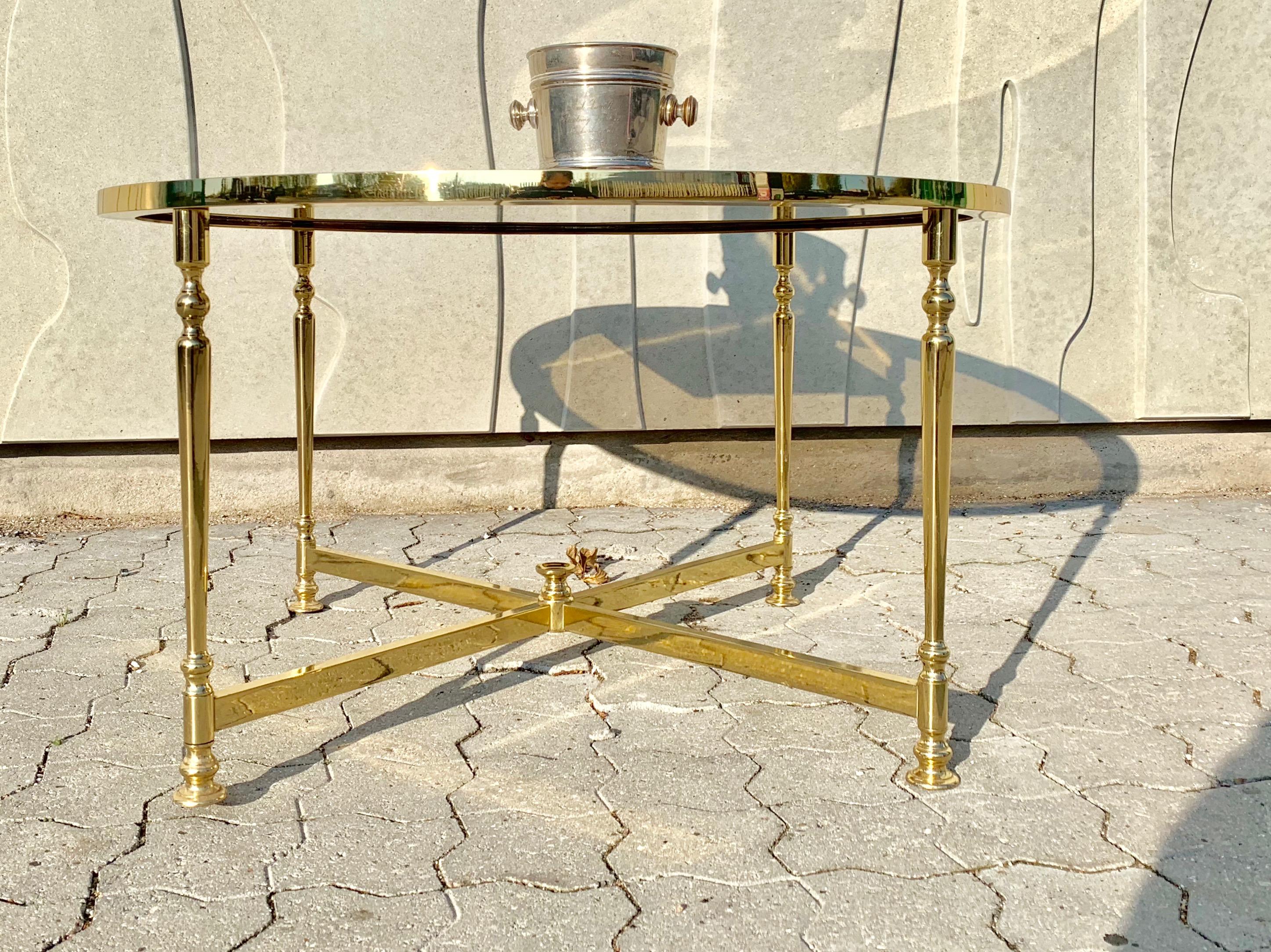This table by Lysberg, Hansen & Therp Denmark has a solid polished brass structure and a smoked glass plate. The table is rare and have been featured at a few auctions in Denmark.

Lysberg, Hansen & Therp, was purveyor to the royal household of