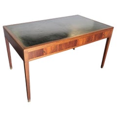 Lysberg Hansen & Therp writing table , desk with leather top .