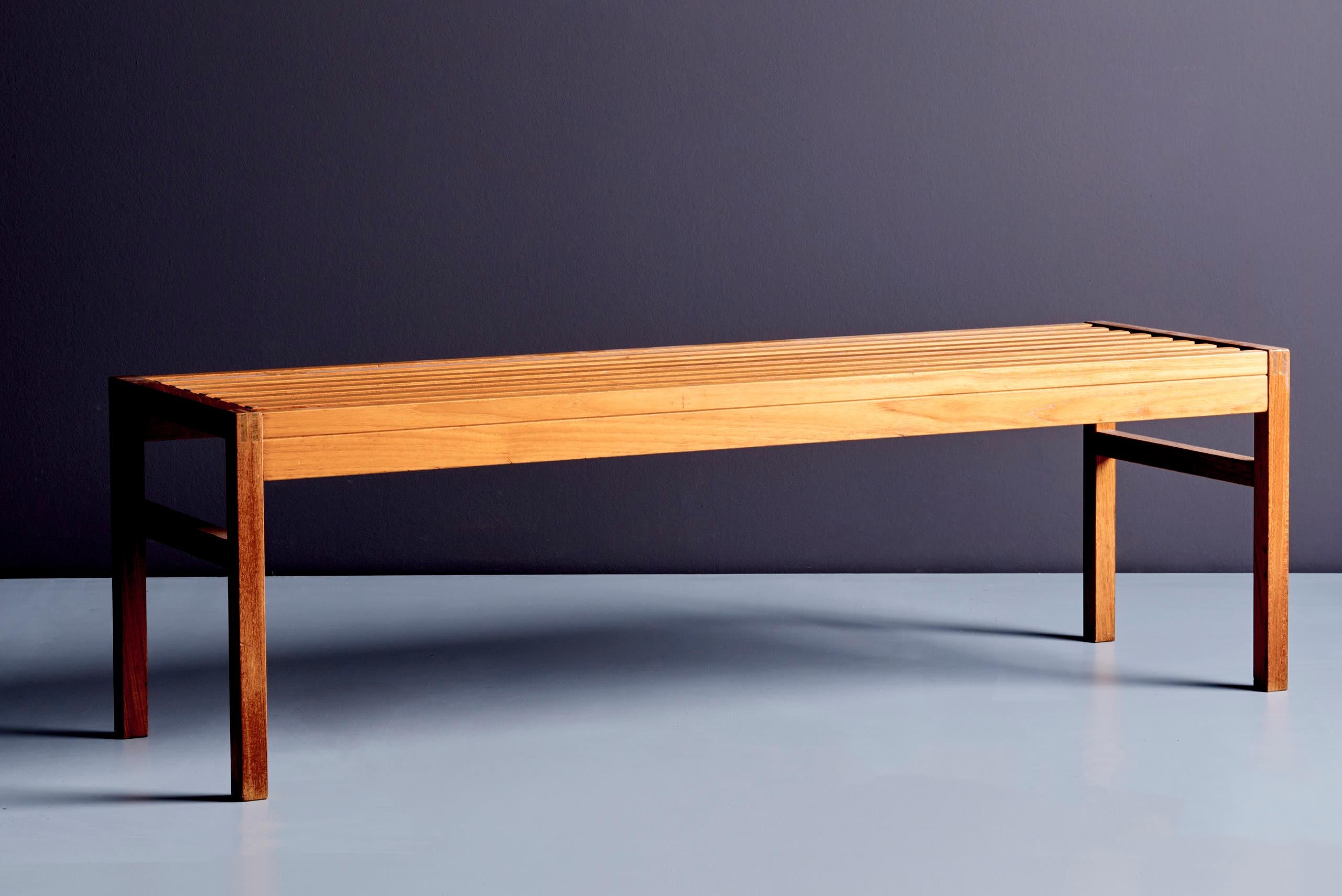 Danish mid-century teak slat bench by Lysgaard Møbler. Minimalist design with square legs and stretcher bars, original maker’s label. Versatile as bench, coffee, or side table. Vintage condition with minor wear consistent with age.
