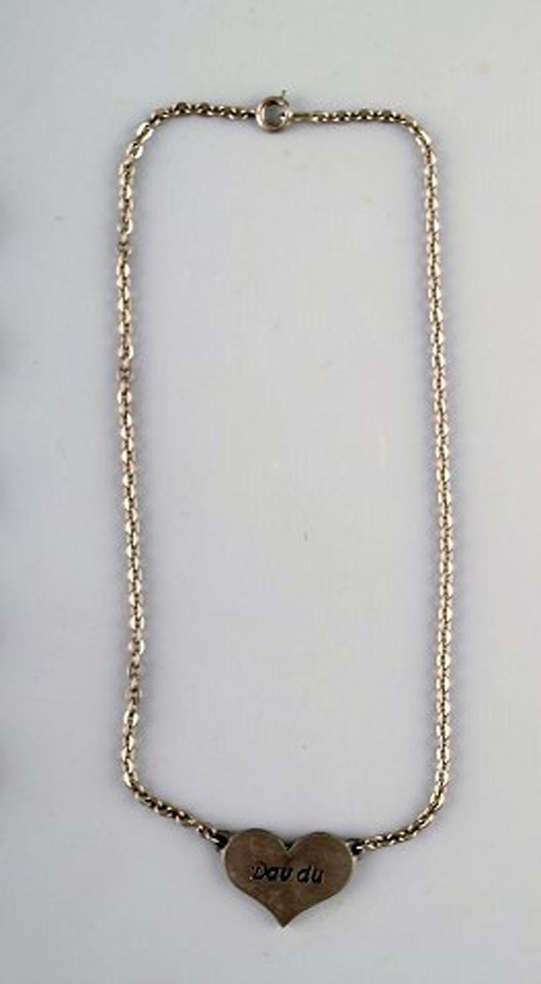 Lysgaard's design. Denmark. two necklaces in pewter, one with a heart and the other with amber coloured stones. Modern design, 60 / 70 s.
The chains measures: 41 cm. Heart pendant measures: 2,6 cm x 2 cm.
In very good condition.
Stamped.