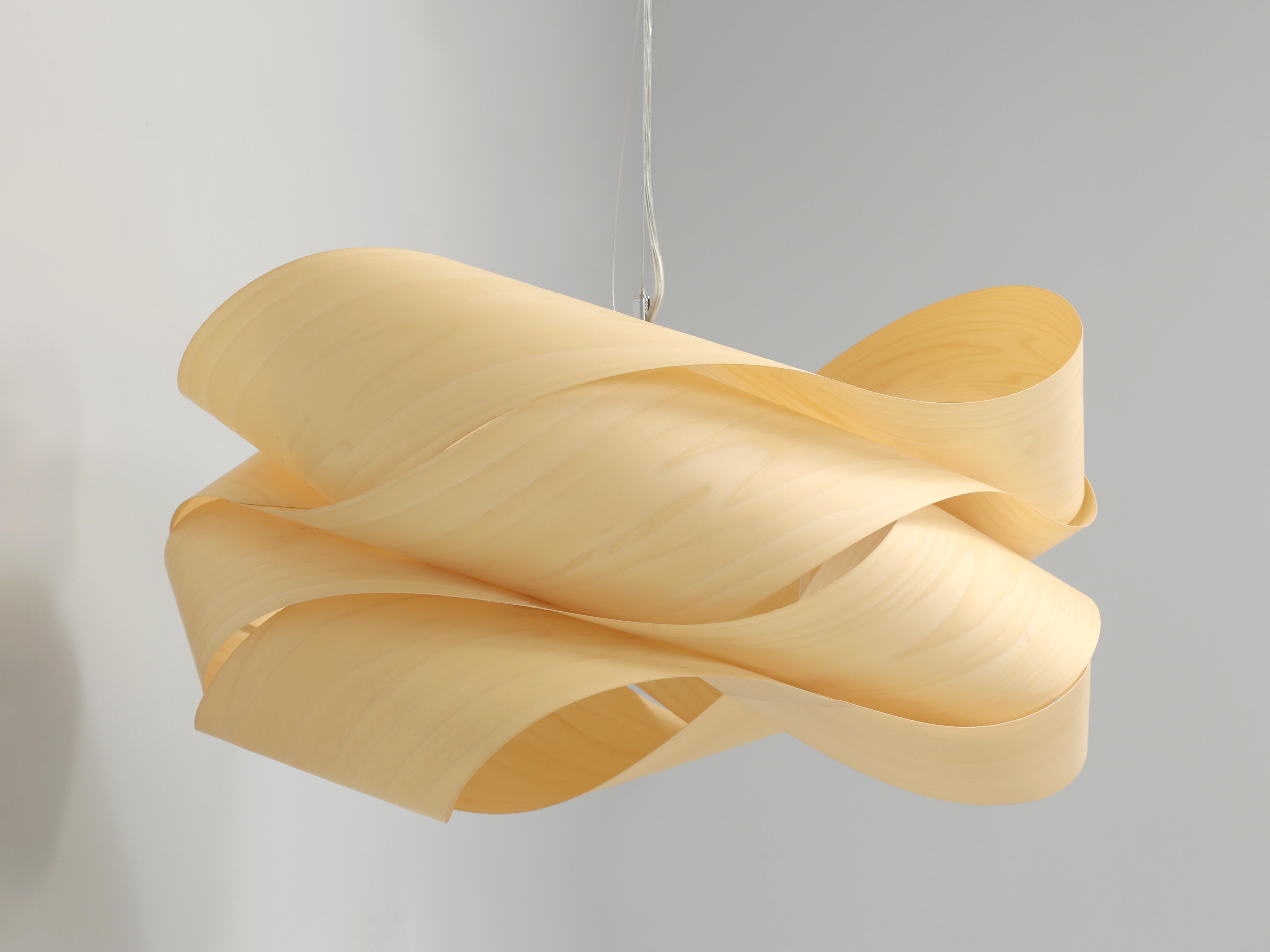 The LZF Link Wood Veneer Pendant chandelier was designed by Ray Power. For those of you who are familiar with our Old Plank inventory, you will notice that this very modern style chandelier is quite out of character for us. However, there is