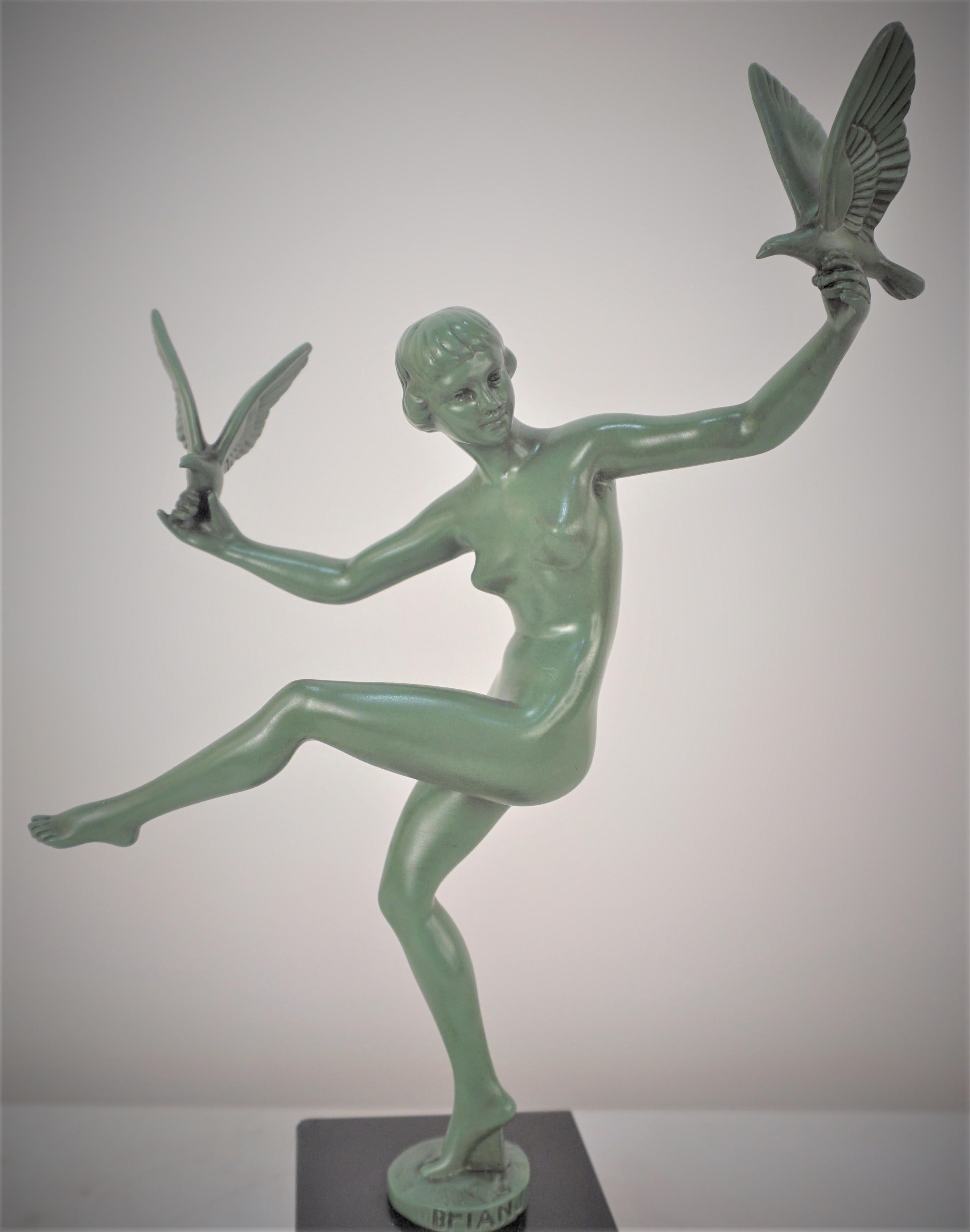 Bird dancer by Max Le Verrier foundry, Paris in the 1930’s finished in green standing over a square black marble base.