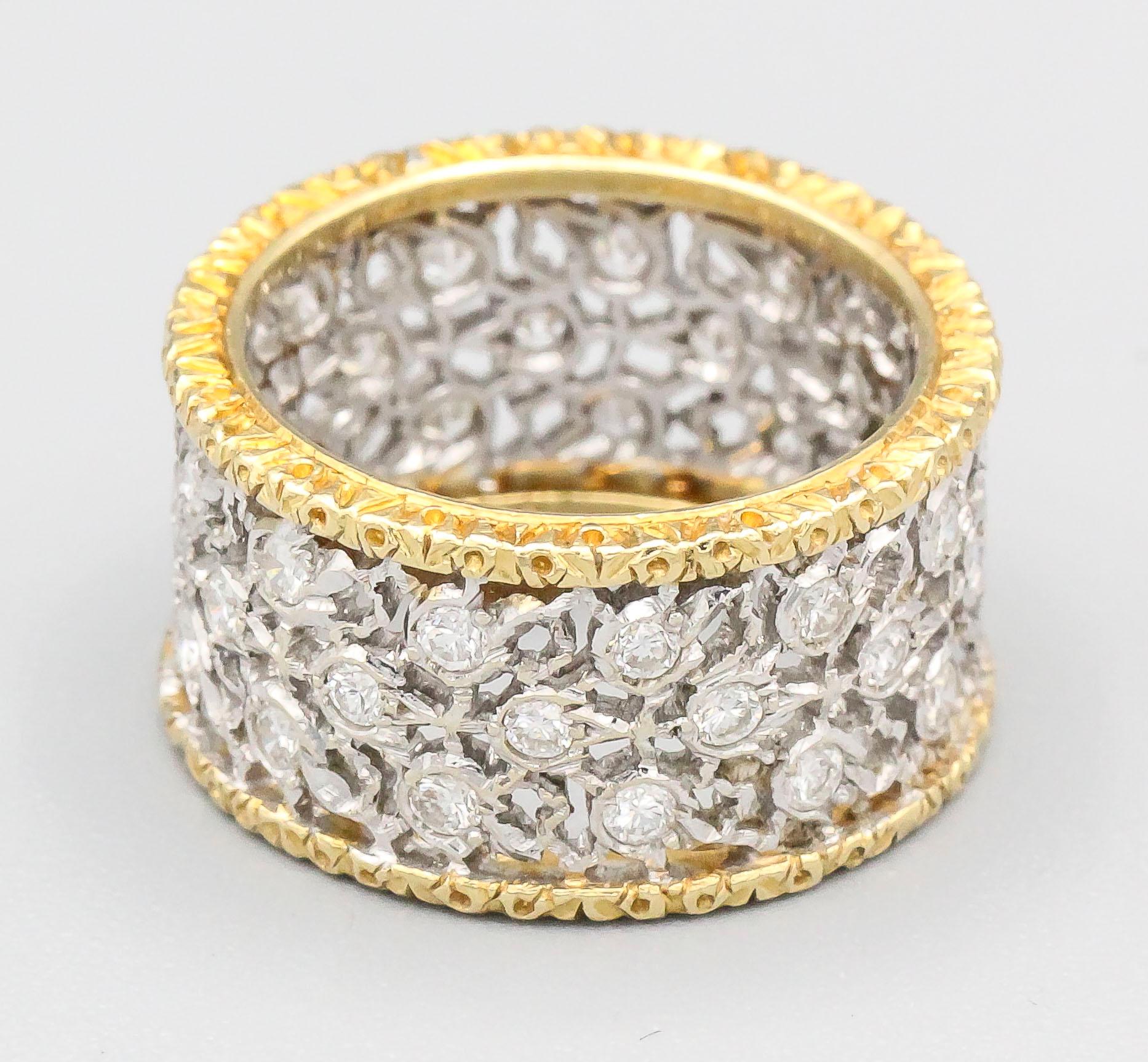Fine 18K yellow gold and diamond band ring by Mario Buccellati. It features a three row leaf motif with high grade round brilliant cut diamonds of approx. 1.00 cts. Size 4.

Hallmarks: M. Buccellati, Italy, 750, Italian standard marks.