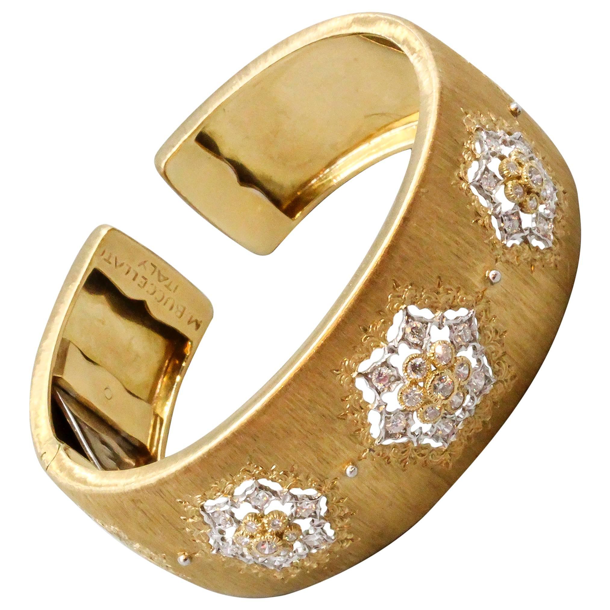Timeless diamond and 18K yellow gold wide cuff bracelet by Mario Buccellati. It features high grade round brilliant cut diamonds along with their trademark lattice style gold design with the signature Florentine satin-like finish. Expert workmanship