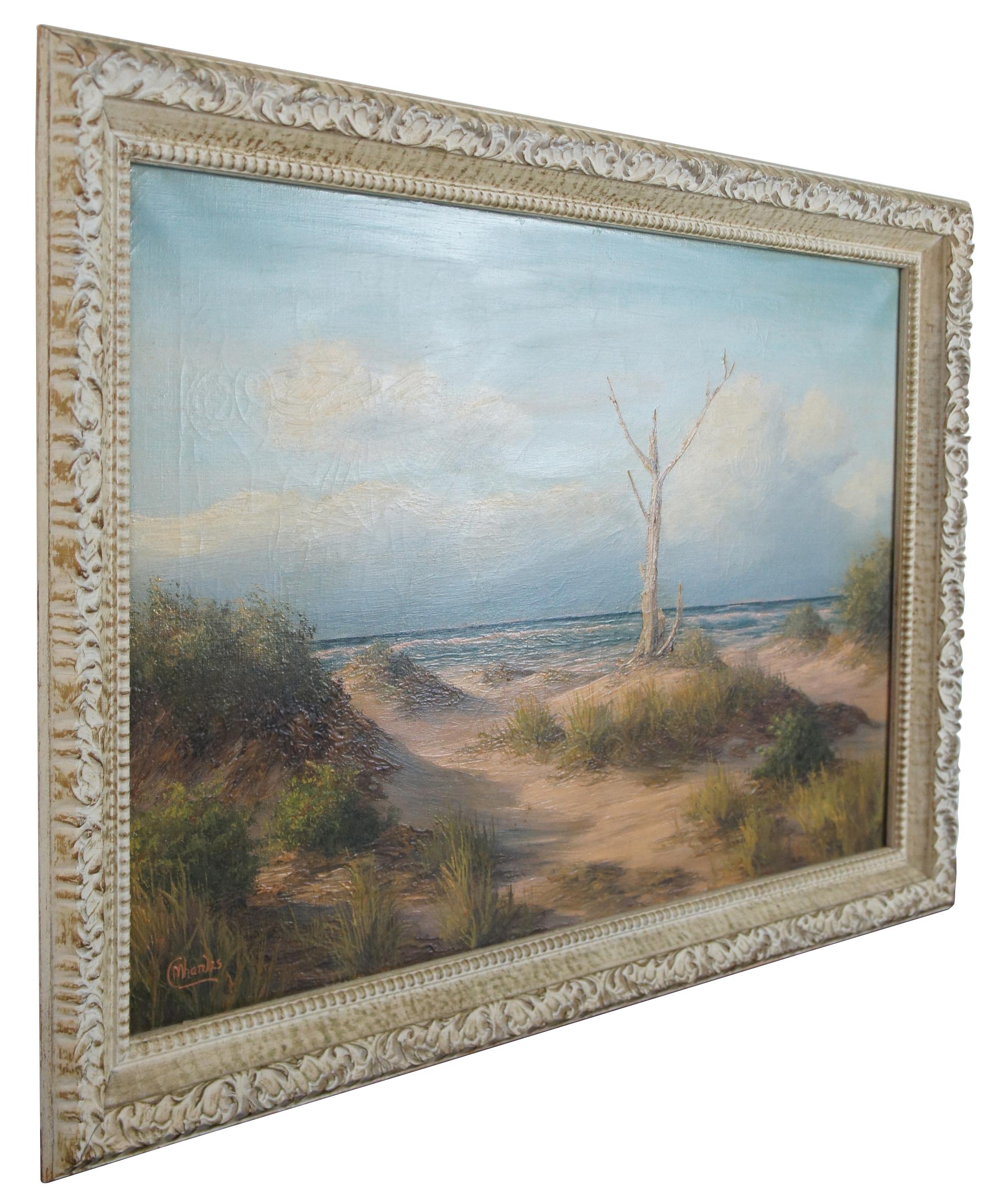 Oil on canvas landscape painting of a dead tree in the middle of sand dunes at the edge of the ocean, signed M. Charles. Donald Leary 1916-1991 painted images of the Outer Banks North Carolina under the name M Charles. He Signed his works 
