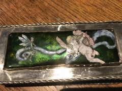 M D Spooner, A Silver plated Hand Enamelled Jewellery Box with Cupid & a Fairy
