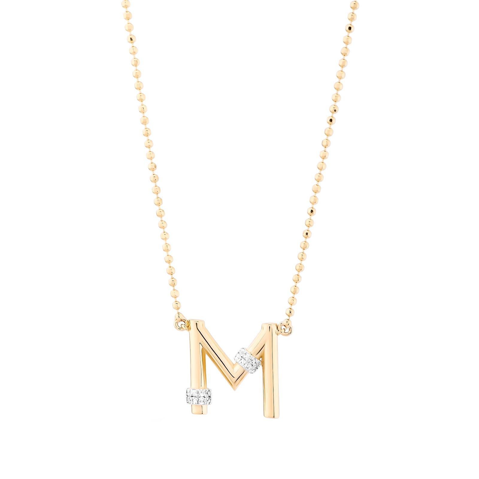 gold m necklace with diamonds