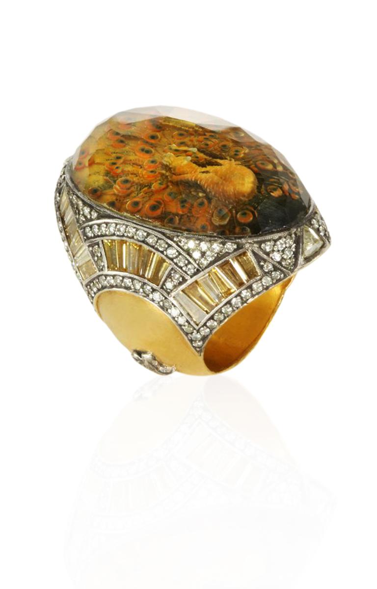 Peacock Ring 

Gold and diamond creations by Sevan Bıçakçı’s

Gold: 9.5 g
Silver: 16.22 g
TDW: 4.89 Ct
Sem Pre St: 40.5 Ct