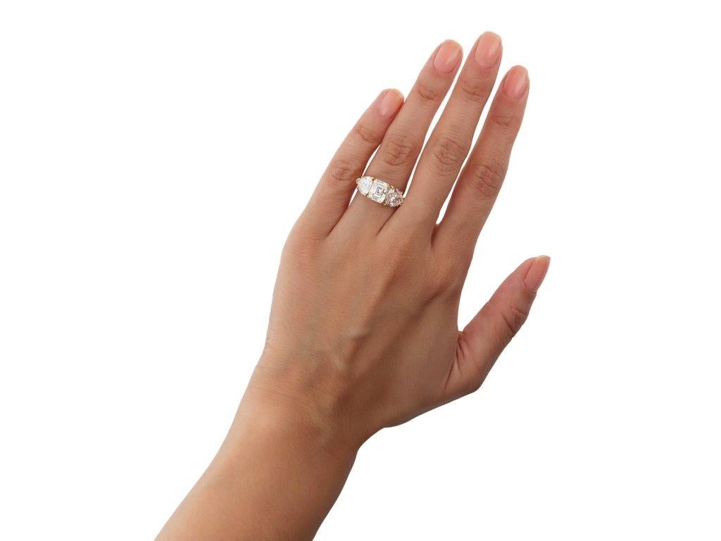 Emerald Cut M. Gérard diamond three stone ring, French, circa 1970. For Sale