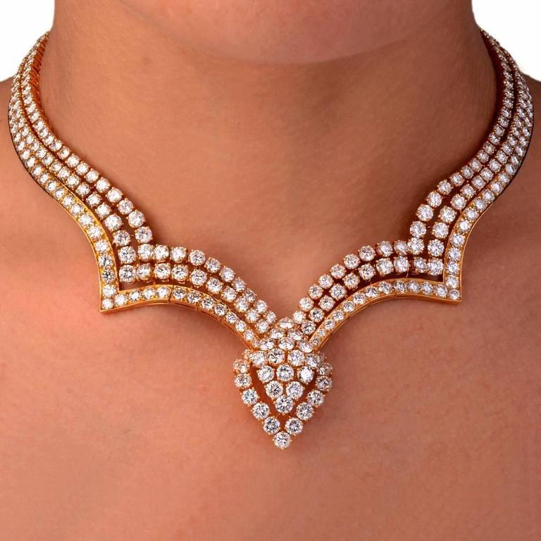 This elegant French diamond necklace is hand crafted in solid 18K yellow gold by Louis Gérard, formerly of Van Cleef & Arpels, founder of M. Gerard. This diamond necklace constitutes three rows of graduated round-faceted diamonds. The high quality