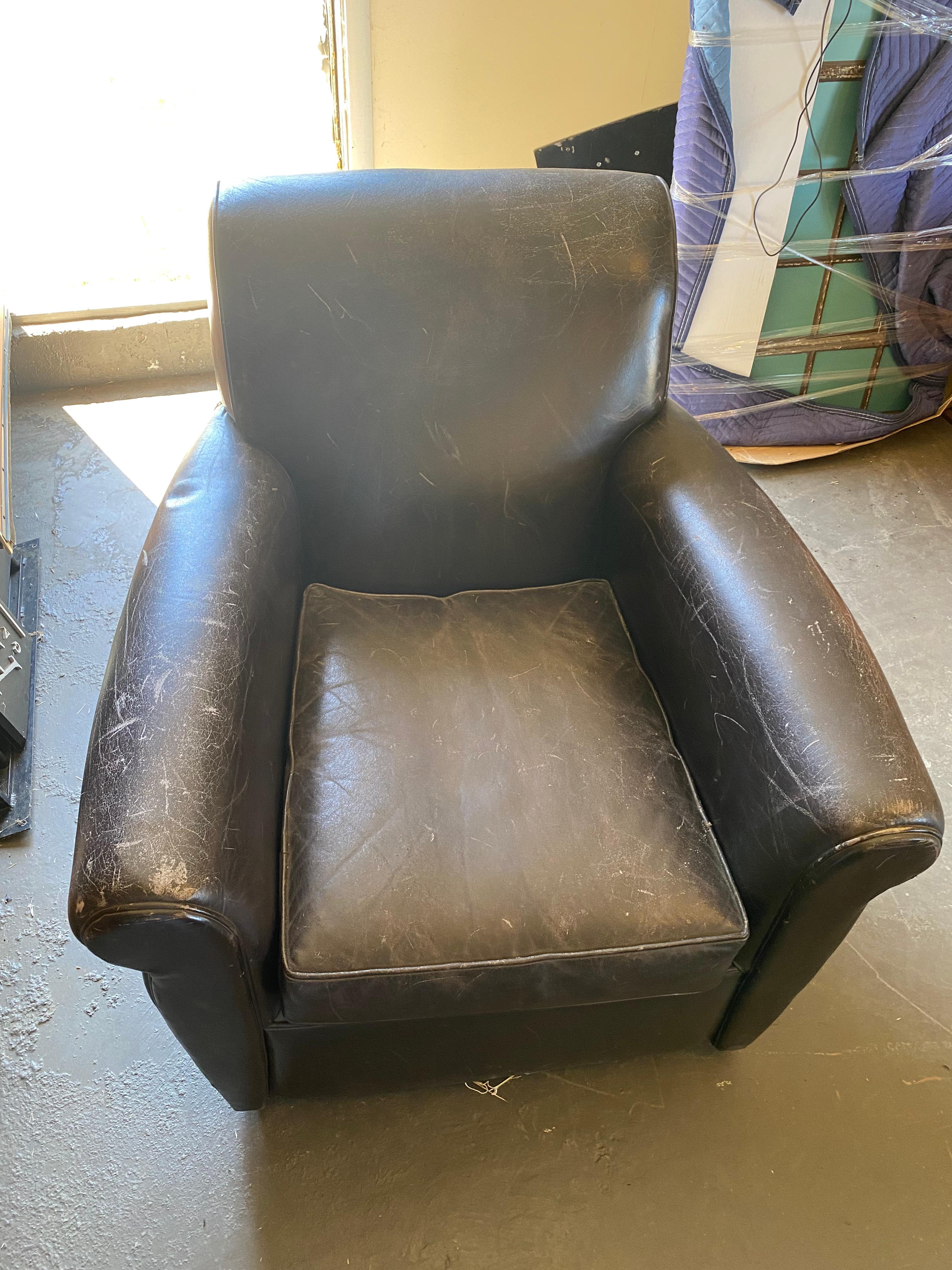 Vintage leather club chair by San Francisco Designer M. Gold. The back has a nice piping detail.