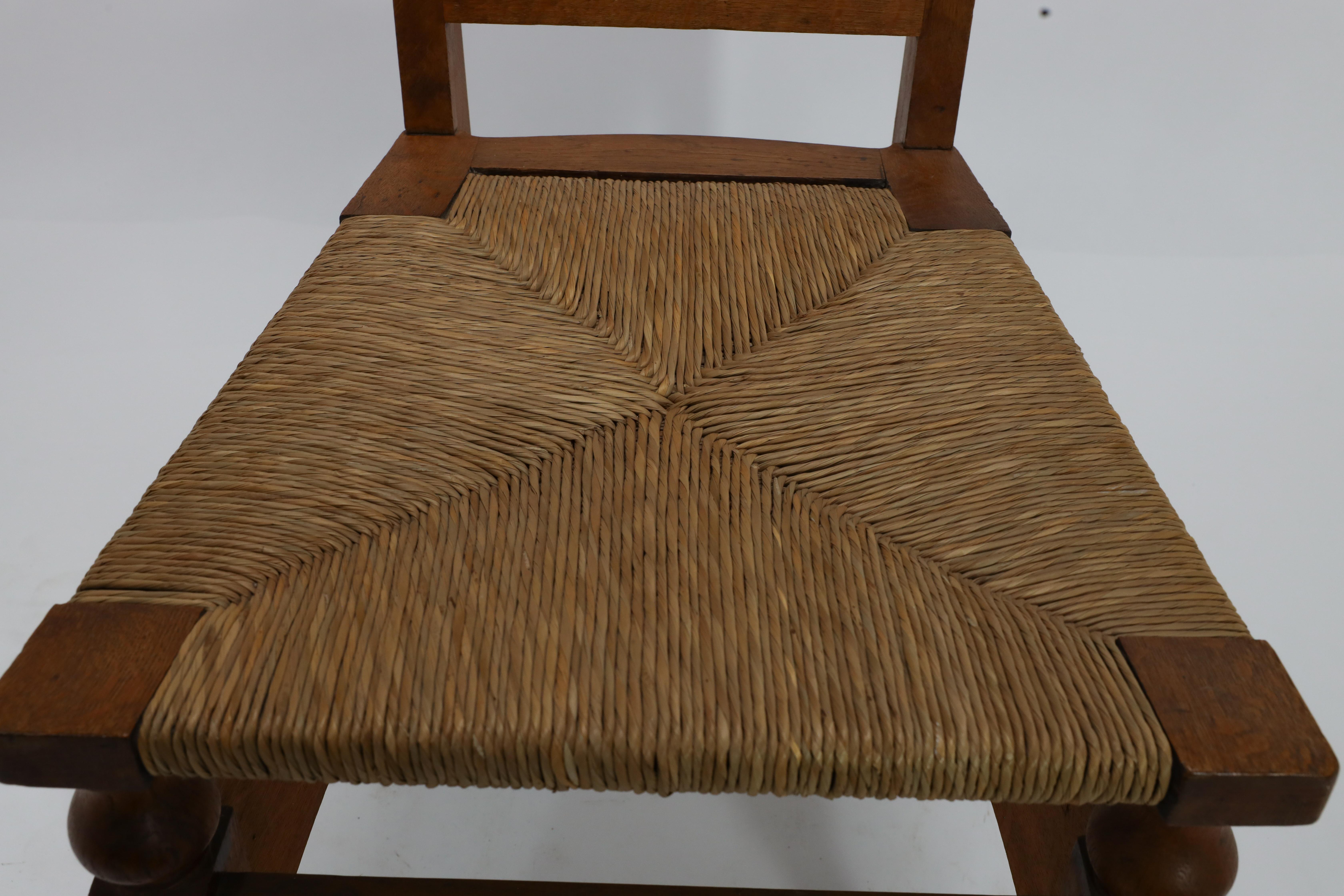 20th Century M H Baillie Scott attri An Arts & Crafts Oak Chair With Stylised Floral Cut-Outs For Sale