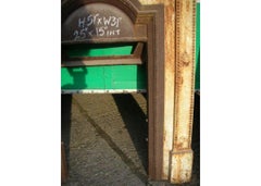 M H Baillie Scott, Style of. A Tall Arts & Crafts Cast Iron Decorative Fireplace