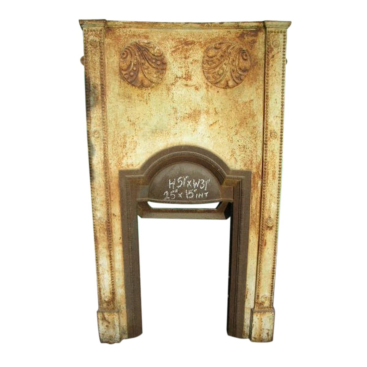 M H Baillie Scott, Style of. A Tall Arts & Crafts Cast Iron Decorative Fireplace For Sale