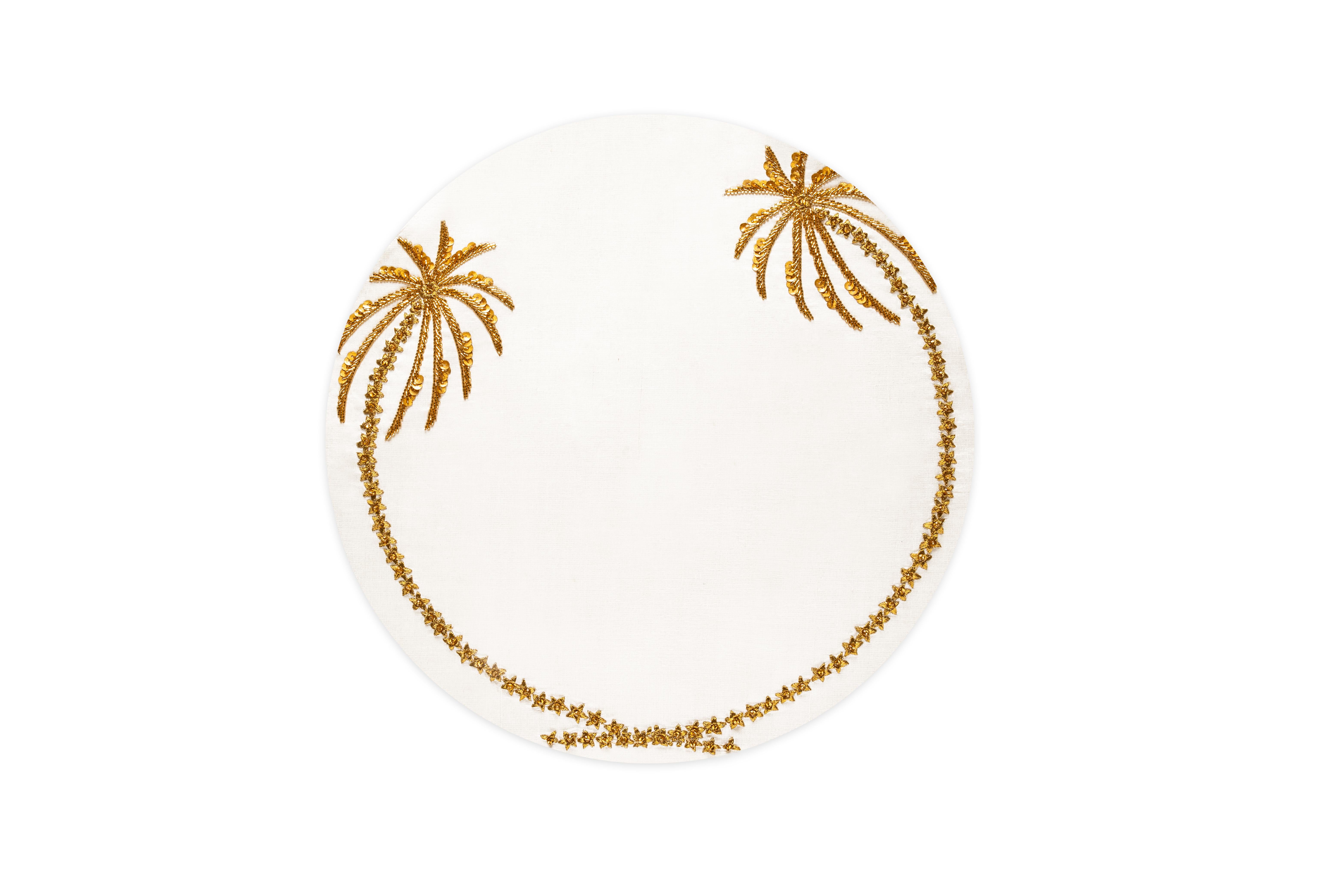 All hand made, Les Palmier placemat marries two palm trees to create a magnificent halo around your dinnerware. The trunks are intricately embroidered with gold threads while the palm leaves are fashioned with beadwork.