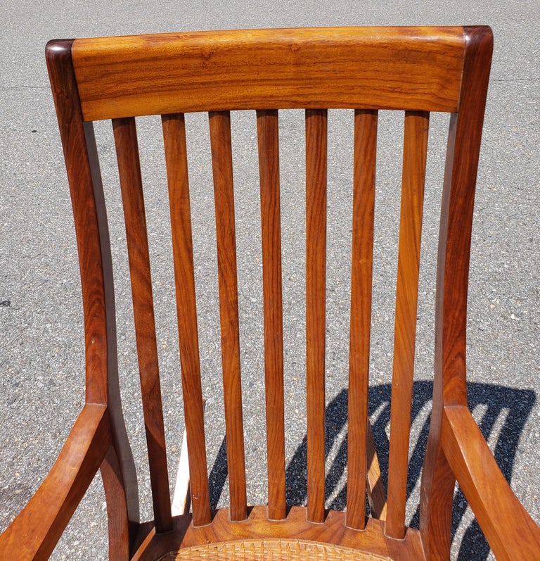 Woodwork M. Hayat & Brothers Anglo-Indian Hardwood Woven Wicker Seat Rocking Chair For Sale