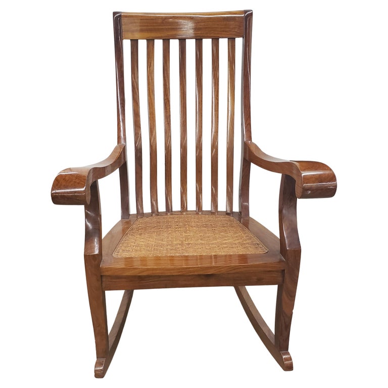 M. Hayat & Brothers Anglo-Indian Hardwood Woven Wicker Seat Rocking Chair In Good Condition For Sale In Germantown, MD