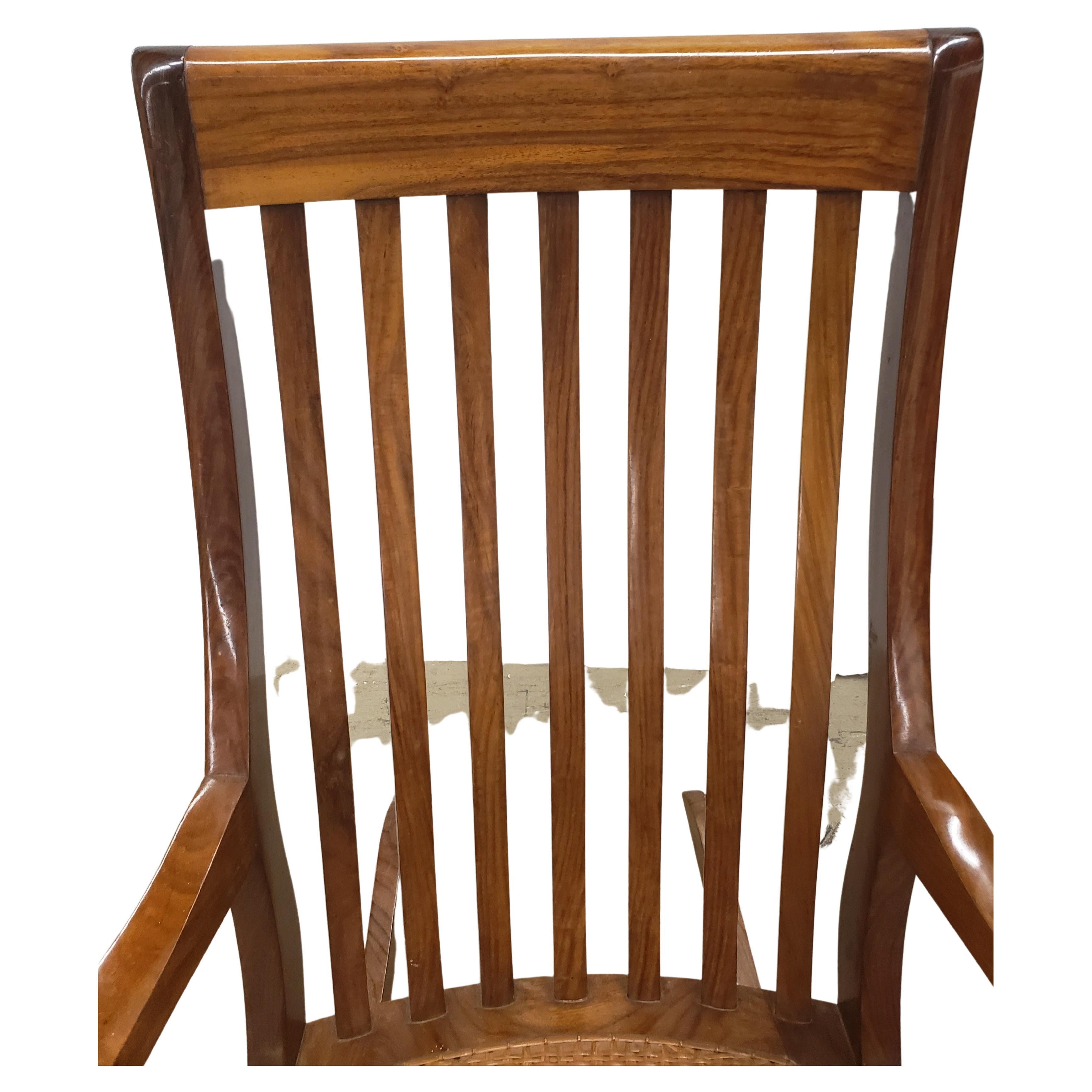20th Century M. Hayat & Brothers Anglo-Indian Hardwood Woven Wicker Seat Rocking Chair For Sale
