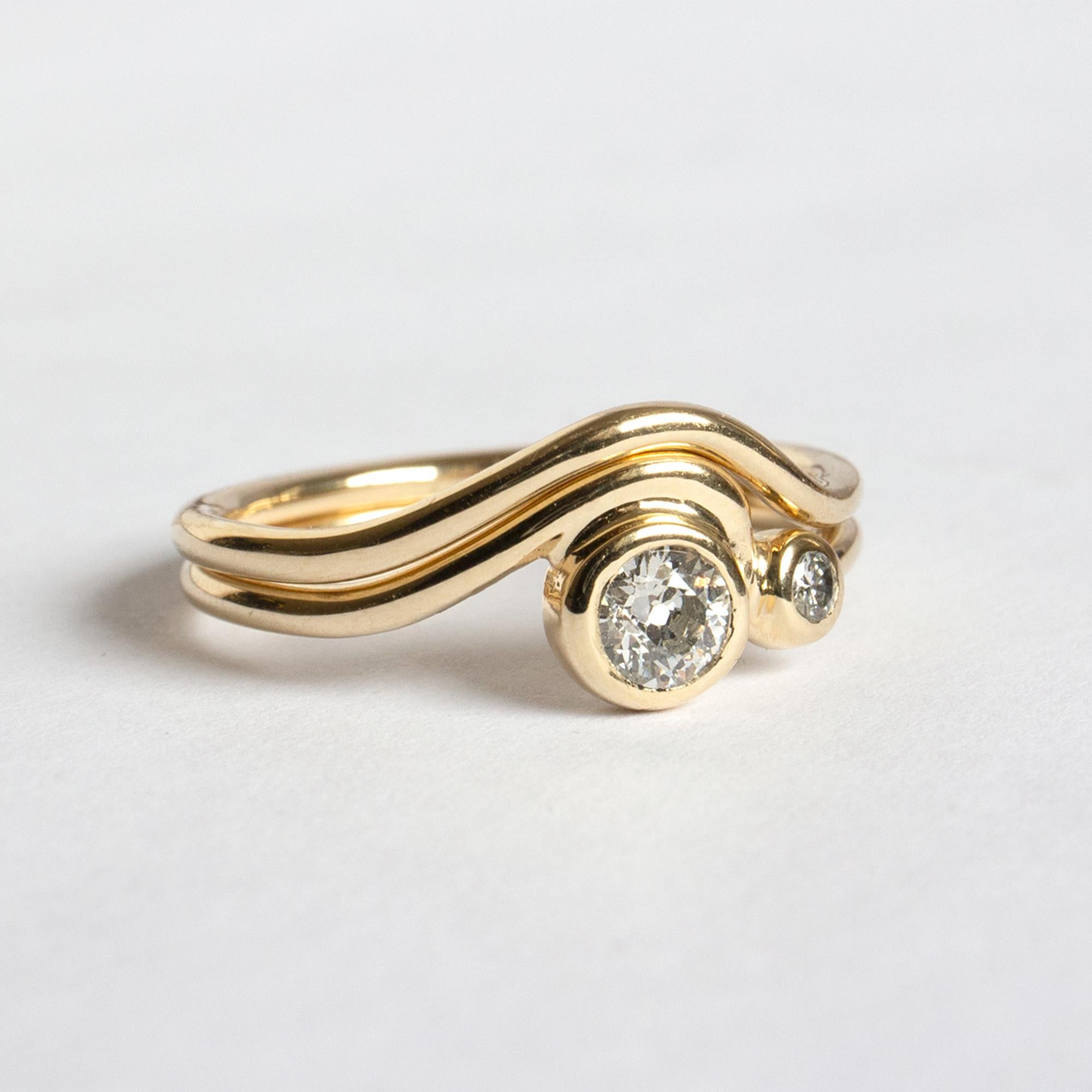 The fluid wave of the Masumi, now as delicate band. Nests perfectly alongside the 0.25ct and 0.5ct Diamond Masumi Rings, lovely alone or as a set.

READY TO SHIP IN 14K YELLOW GOLD OR 14K ROSE GOLD
INDICATE US RING SIZE VIA MESSAGE