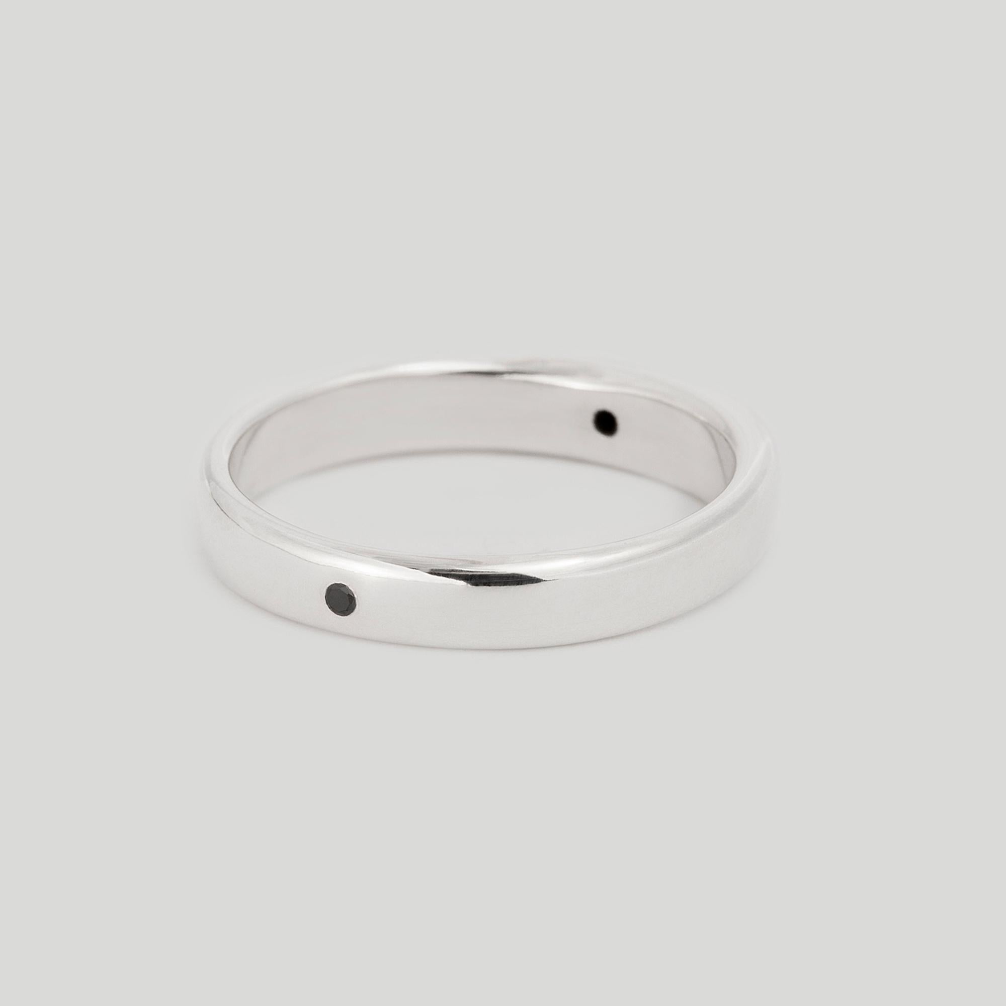 Two ends of a spectrum. A formal representation of dark and light matter.

STERLING SILVER
US RING SIZE 7
READY TO SHIP
*Shipment of this piece is not affected by COVID-19. Orders welcome!*

STONES
◘  (North axis) 1.3mm brilliant-cut White Diamond
◘