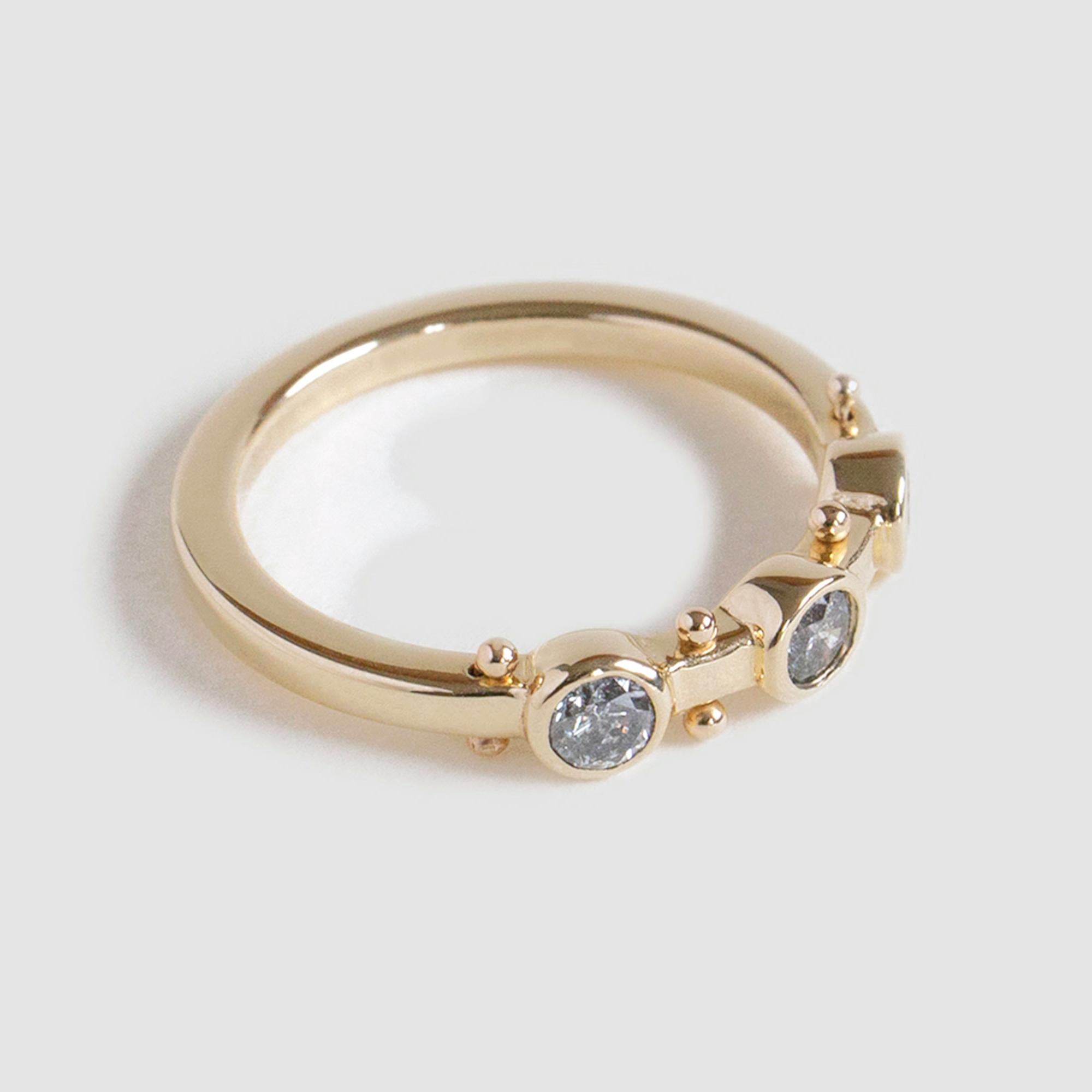Kaori, meaning fragrance in Japanese. A patchwork of sensory elements, creating a liveliness easier felt than described. The straight profile of this band makes it easy to stack alongside other flat bands.

14K YELLOW GOLD
US RING SIZE 7
*Resizing