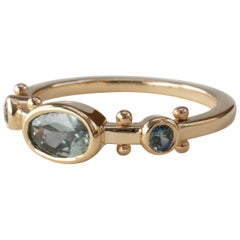 M. Hisae Oval Teal Blue Sapphire Trinity Ring