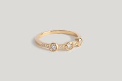 M. Hisae Three-Stone White Diamond Band