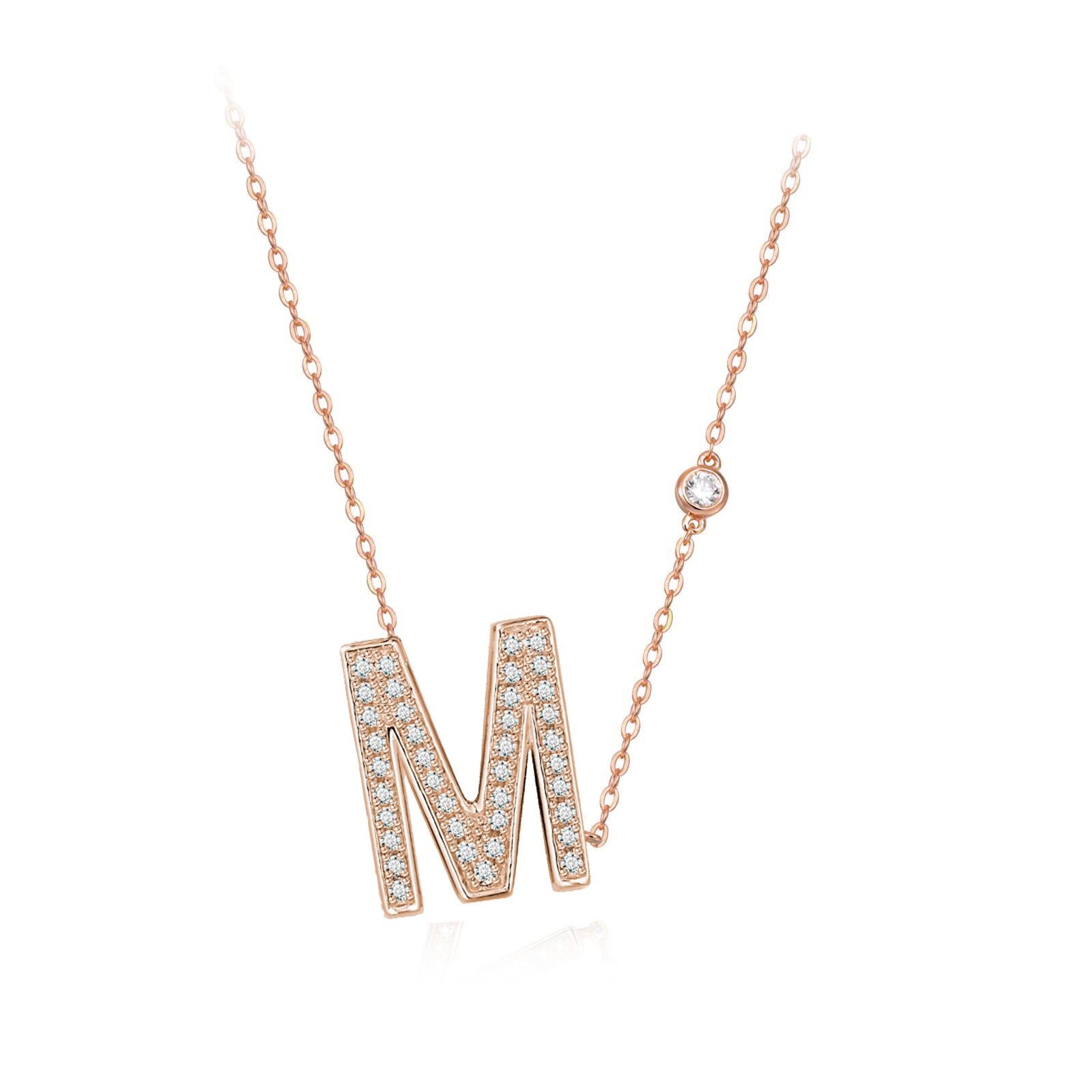 Nothing says YOU more than YOU. You are unique. You are bold. You're not afraid to share who you are. This initial bezel chain necklace is elegantly slimline while sharing a little bit about yourself with others. .925 sterling silver base also