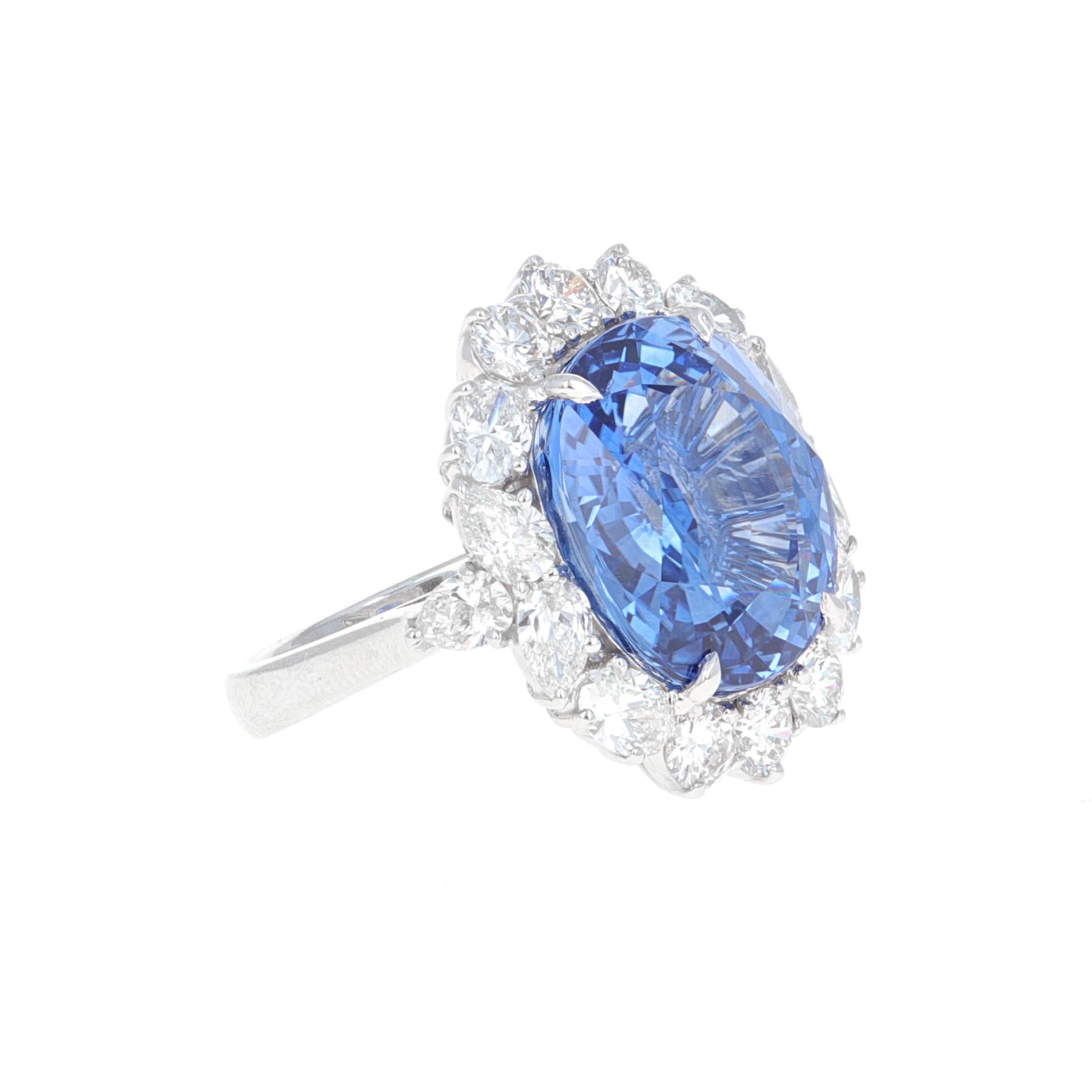 Beautifully hand made 18.83 carat sapphire and diamond cocktail ring. The sapphire has been certified by the Gemological Institute of America,  GIA. GIA describes the stone as a Natural Blue Sapphire with indications of heating. The origin of the