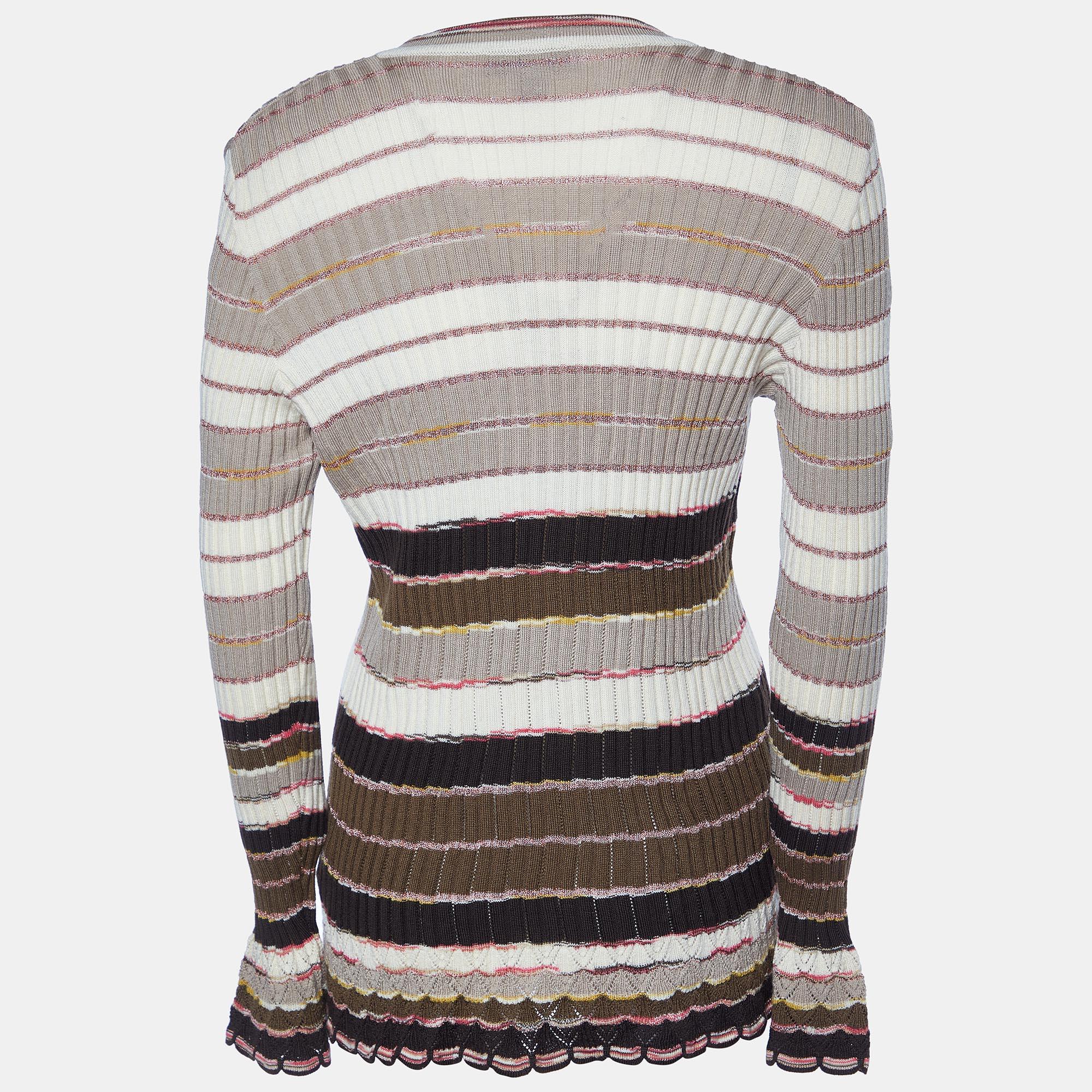 Conçu par M-One, ce cardigan vous permettra à coup sûr d'être impeccable pour la journée. Il est créé à partir d'un tissu de qualité et présente un design tendance. 