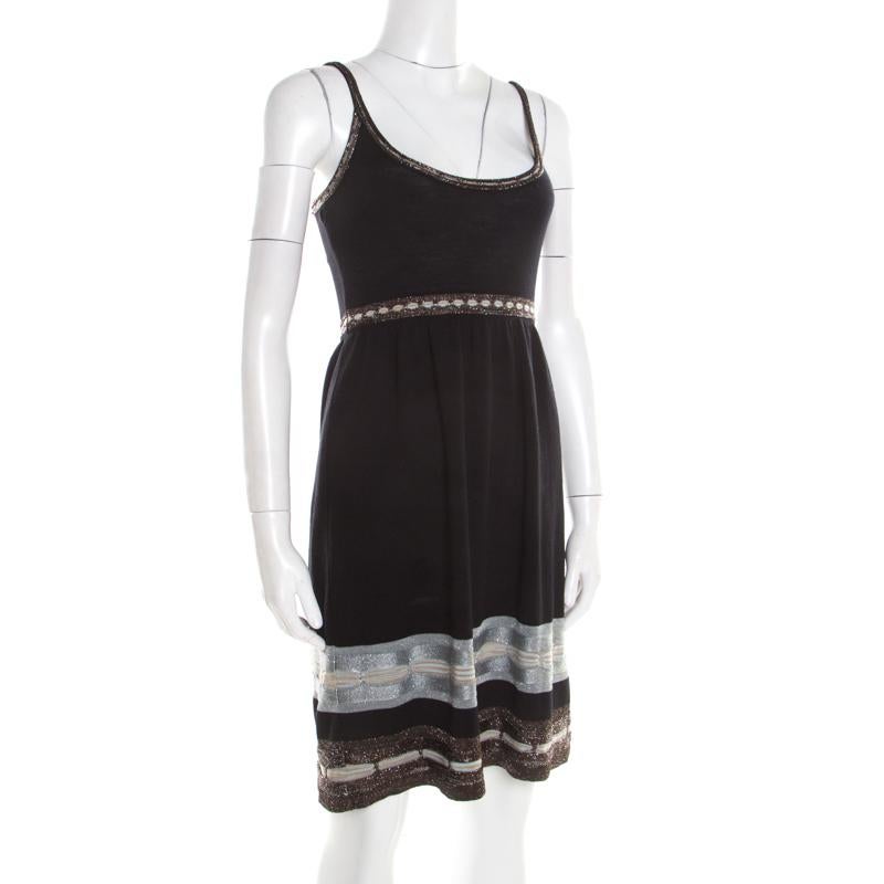 M Missoni's sleeveless dress is crafted into a sleeveless style. It features a flattering silhouette and a classic black hue. Pair this dress, crafted from a wool blend, with matching sandals for a coordinated look.

Includes: The Luxury Closet