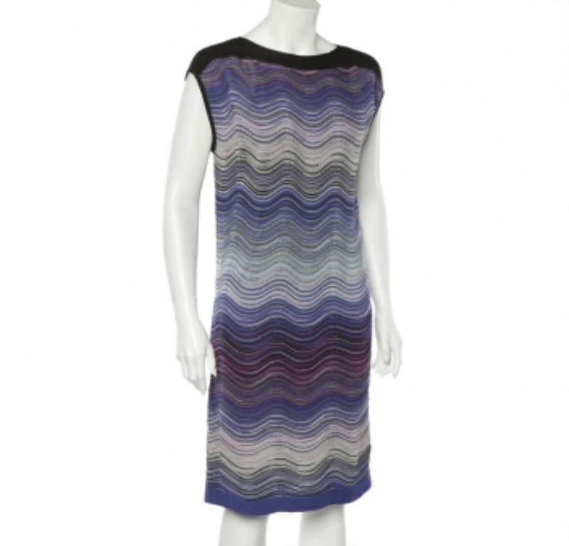 Created with a spread of wave patterns over a relaxed silhouette, the dress from M Missoni makes for an elegant choice on any day. Made using a wool blend, the knit dress can be styled with heels or flats.