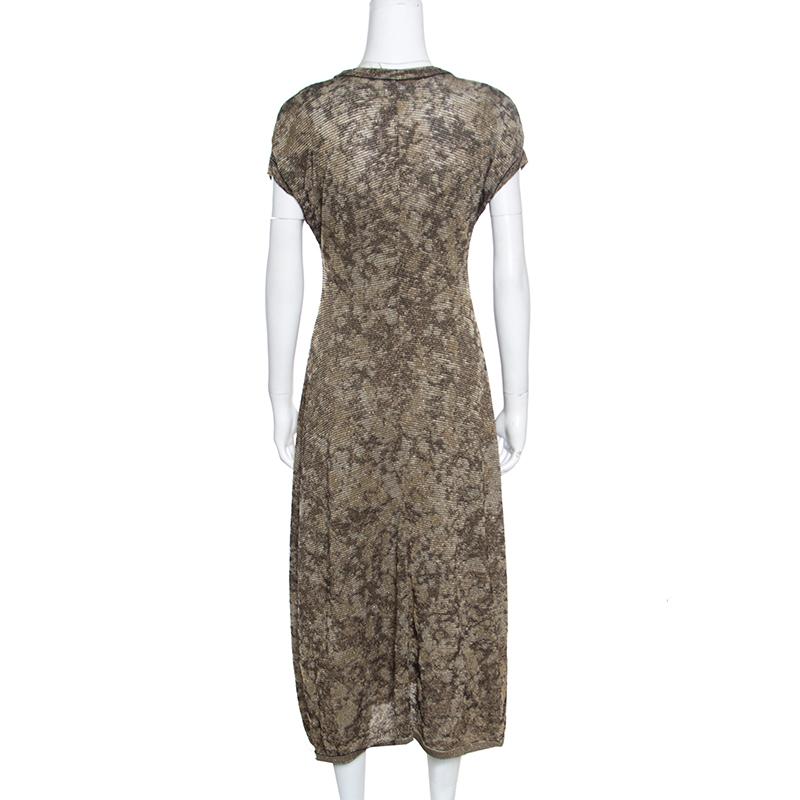 This dress from M Missoni is sure to look amazing on you! It is knit from quality fabrics and designed with short sleeves and a midi hem. You can wear it with flats as well as heels.

Includes: The Luxury Closet Packaging

