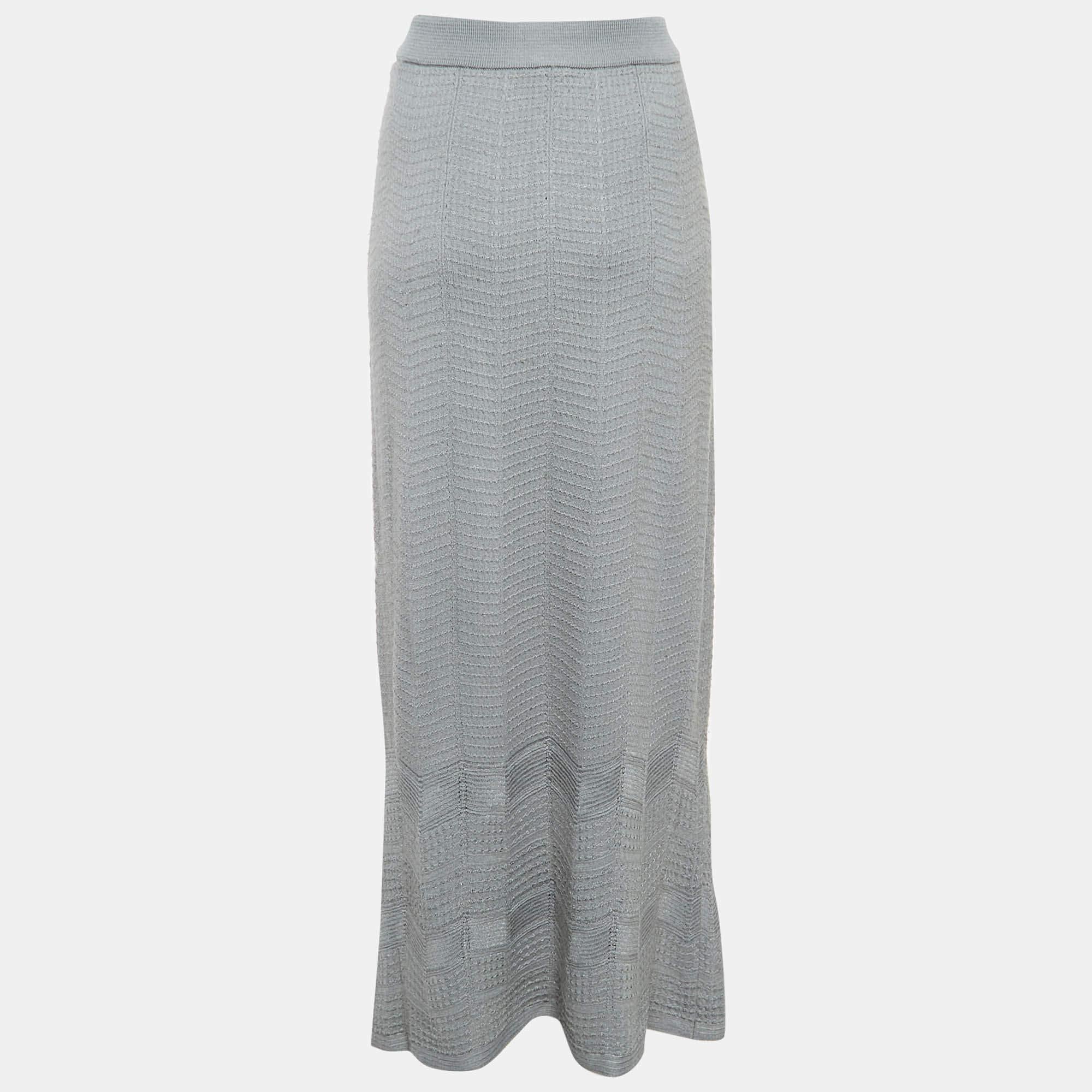 This lovely skirt is beautifully stitched from fine fabric. The comfy designer skirt has a flattering silhouette. Pair it with a simple top and strappy heels for a chic look.