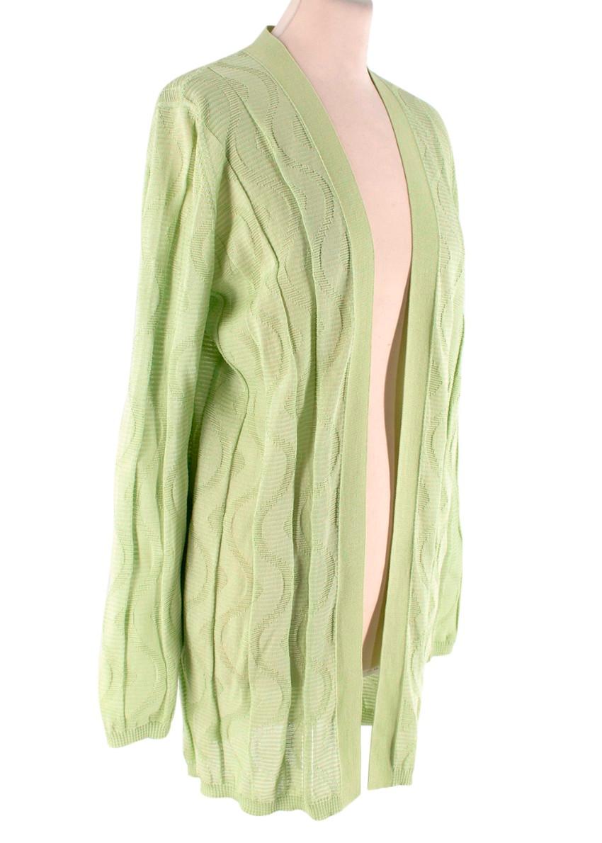 Missoni Light Green Linear Rib Knit Cardigan

- Light green textured knitted cardigan
- Open semi-sheer design
- Ribbed to the hem and cuffs

Materials:
54% Cotton
46% Viscose

Made in Romania
Dry clean only

PLEASE NOTE, THESE ITEMS ARE PRE-OWNED