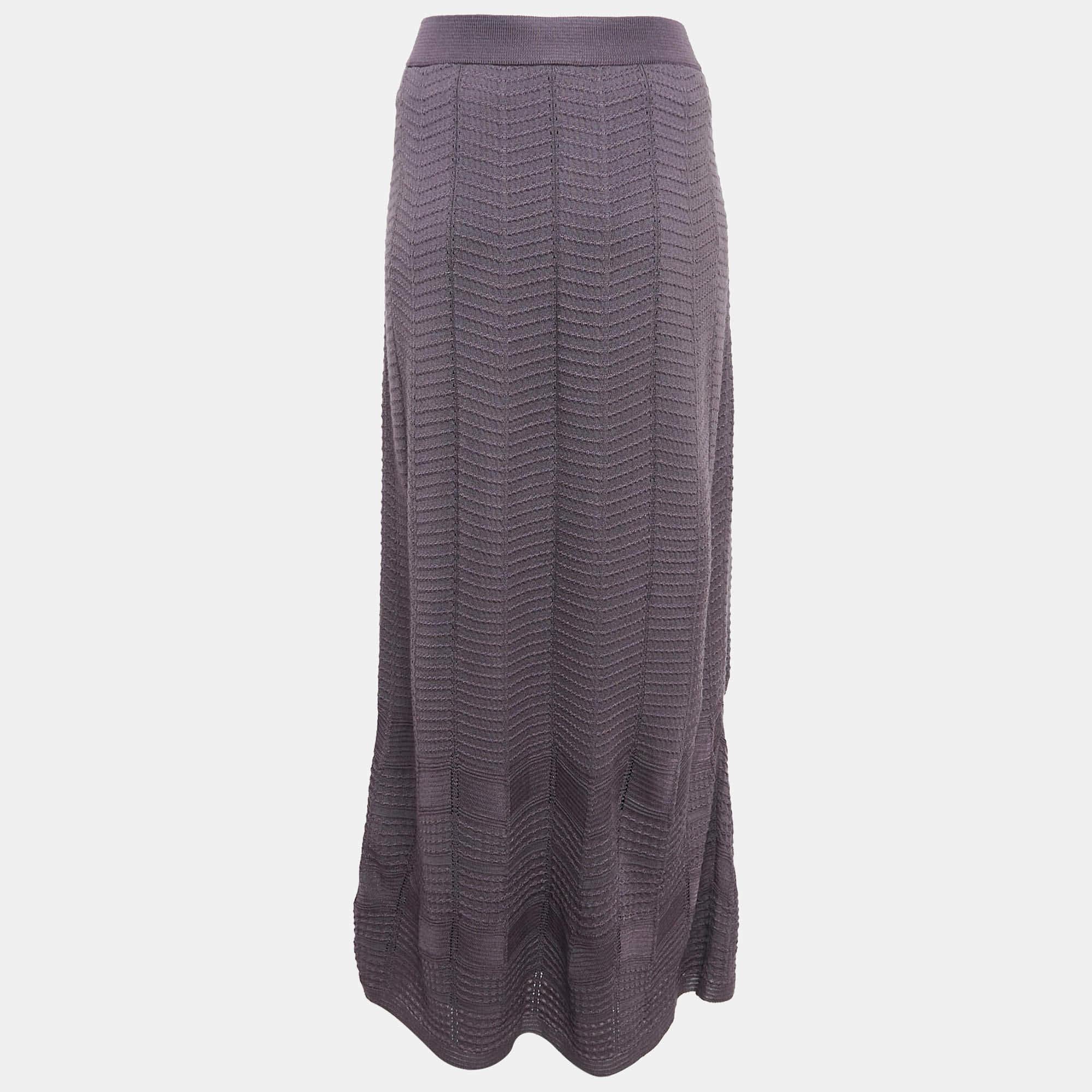 This lovely skirt is beautifully stitched from fine fabric. The comfy designer skirt has a flattering silhouette. Pair it with a simple top and strappy heels for a chic look.