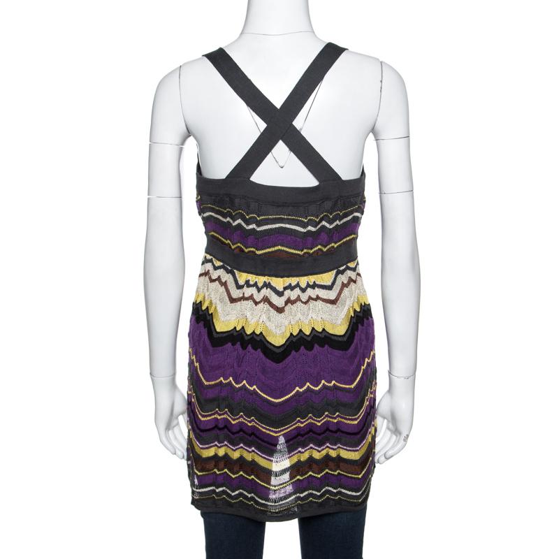 With its feminine aesthetic, M Missoni lets you master the subtle art of desk-to-dinner dressing with this top. Light up any occasion with your fine dressing style when you step out wearing this multicolored top. This fine top made with blended