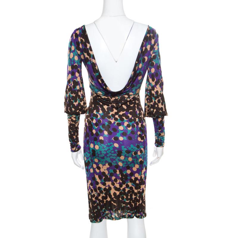 This gorgeous dress from M Missoni is perfect for the fashionable you! It is made of 100% viscose and features multicolor dots printed all over it. It flaunts a flattering silhouette and comes with a bateau neckline and bishop sleeves. It has a