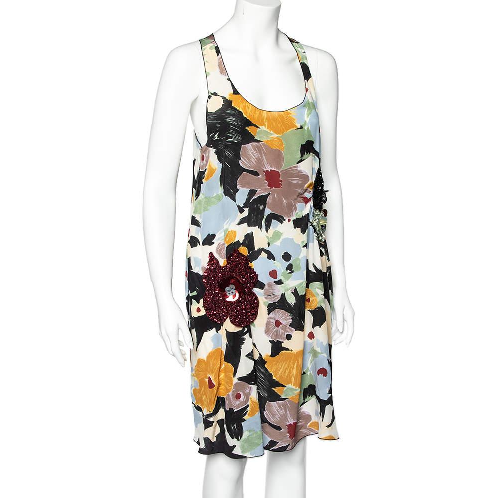 Make a unique style statement wearing this dress from the house of M Missoni. Wear this multicolored floral number with your favorite accessories for a glamorous yet edgy look. Ladylike, this dress is crafted from silk and is adorned beautifully
