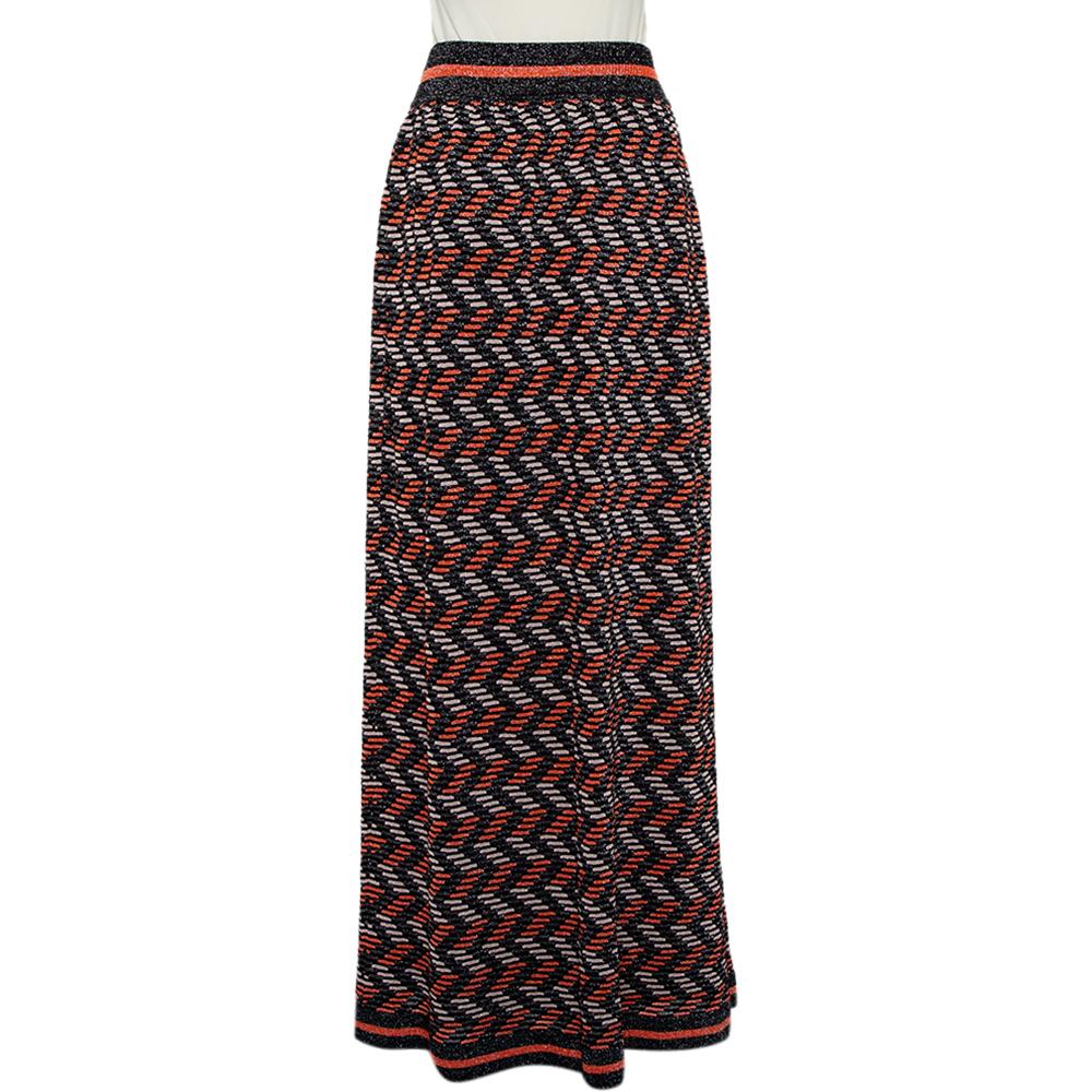 M Missoni’s knitted maxi skirt has geometric patterns set in the weave. The comfortable skirt is detailed with a tie at the waist. Wear it with a pretty blouse and chic sandals.


