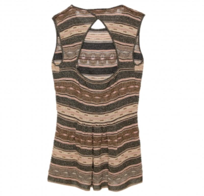 Presenting a chic design made using high-grade materials. Made by M Missoni, this mini dress has a round neckline, patterns all over, and a comfortable fit. The open back provides an added element of style to the dress.