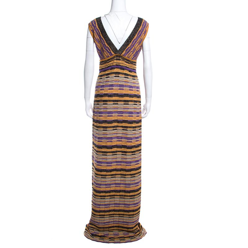 Make a flattering style-statement with this maxi dress from the label of M Missoni. Creatively made in blended fabric, and designed with a plunging neckline and stripes in multiple colours, it'll look great with flats and heels too.

Includes: The