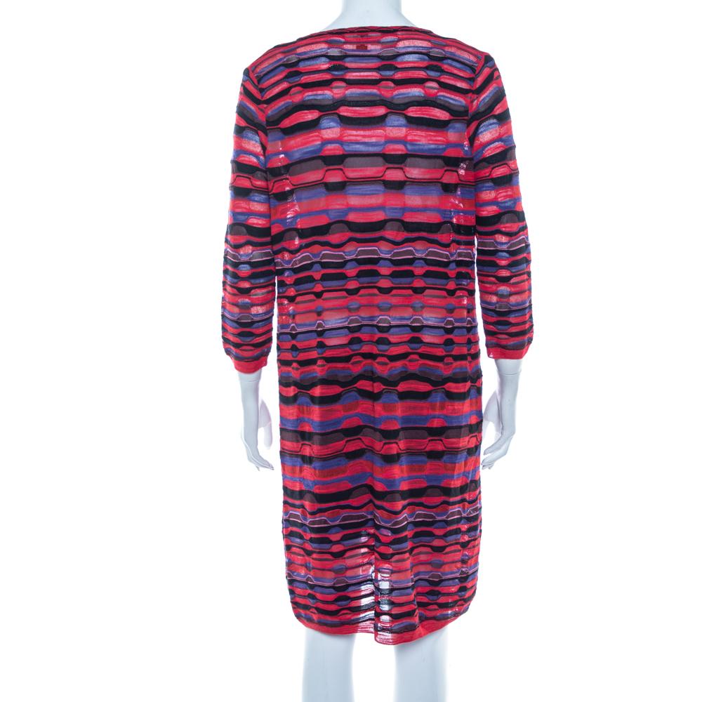 Attain a fun look in this M Missoni dress. A multicolor dress like this will remain a casual treasure in your closet. Finely tailored in blended fabric, this shift dress has a lovely patterned exterior, deep neckline and a comfortable silhouette.


