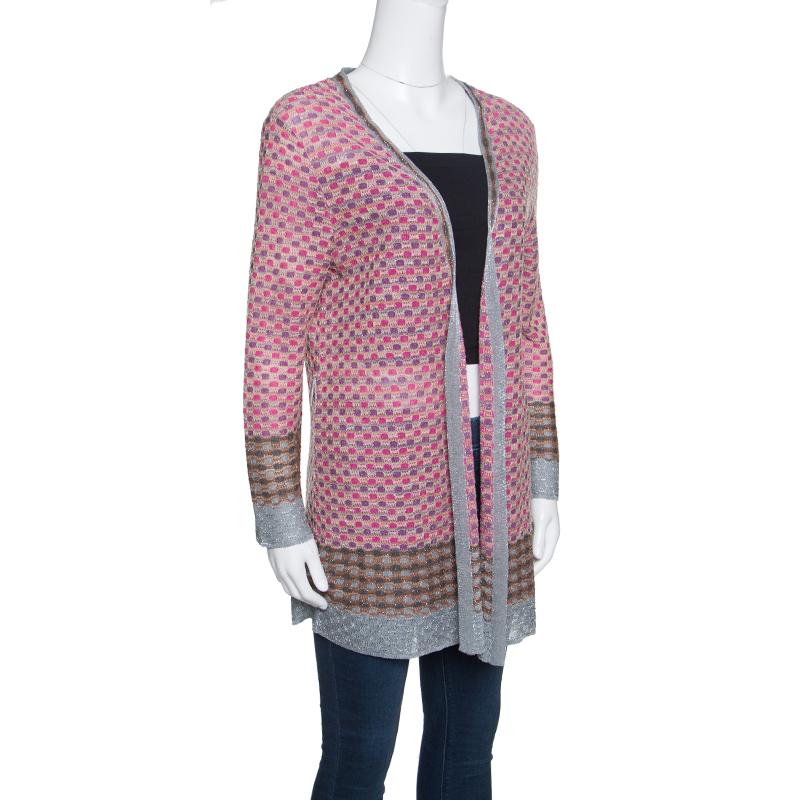 Your search for a stylish and sophisticated cardigan ends with this lovely one from M Missoni. This cardigan is made of a blend of fabrics and features a multicolour knit pattern all over it. It flaunts an open front design and long sleeves. Pair it